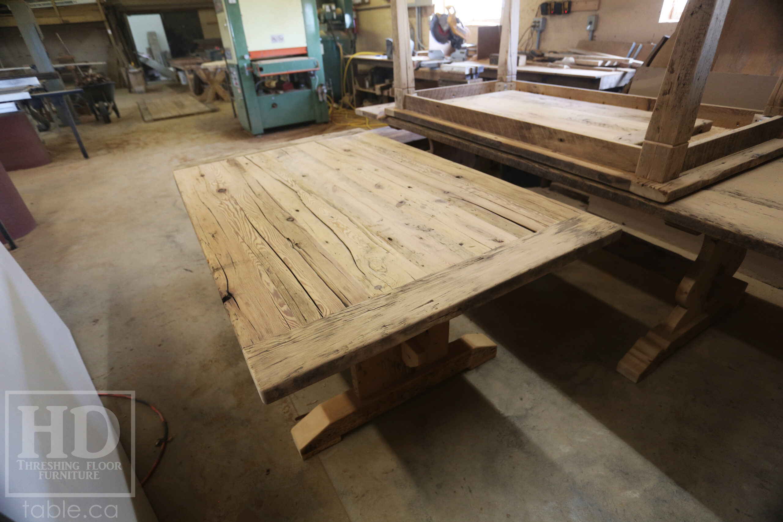 5 1/2' Ontario Barnwood Table we made for a Grimsby, Ontario home - 42" wide - Trestle Base - Old Growth Hemlock Threshing Floor Construction - Original edges & distressing maintained - Premium epoxy + satin polyurethane finish - www.table.ca