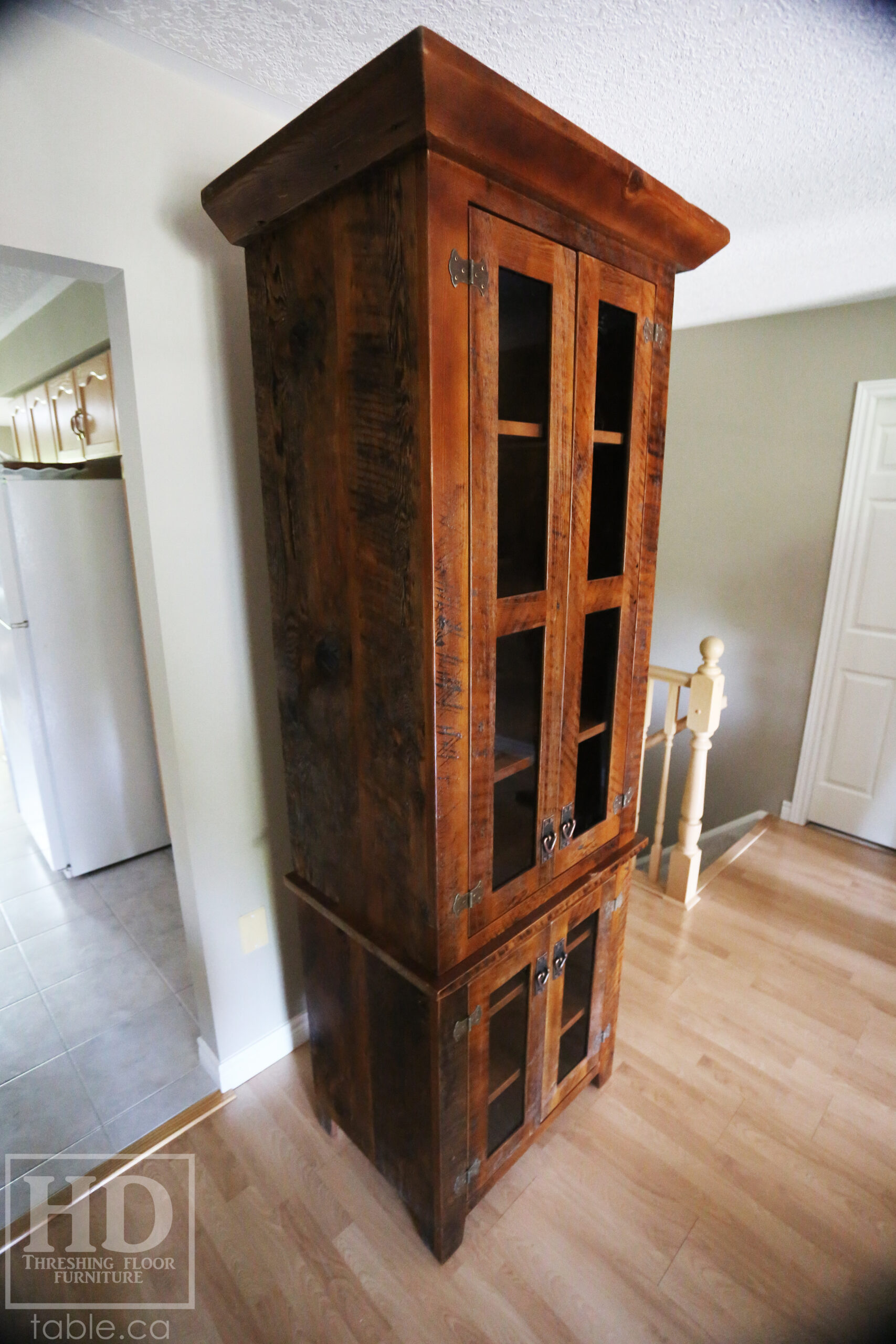 33" Wide Ontario Barnwood Hutch we made for a Guelph Home - 84" height - 20" deep - 2 Top Doors / 2 Bottom Doors / Glass Inserts - Ajustable Shelving Inside - Reclaimed old growth hemlock threshing floor + grainery board construction - Original edges + distressing kept - Mission Cast Brass Lee Valley Hardware - Satin polyurethane finish - www.table.ca