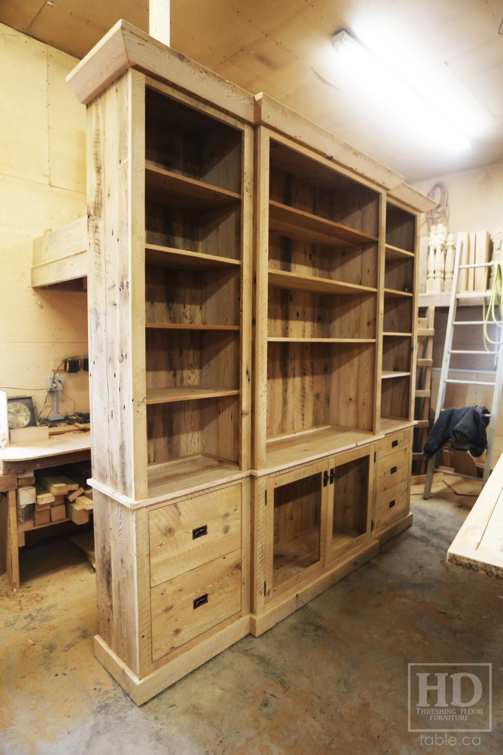 111" Wide Ontario Barnwood Hutch we made for a Torrance cotage - 107" 7/8" height - 16" deep - Centre 45" wide / 18" deep - Outside units proportionally sized - Reclaimed old growth hemlock threshing floor + grainery board construction - Original edges + distressing kept - Lee Valley Hardware - Satin polyurethane finish - www.table.ca