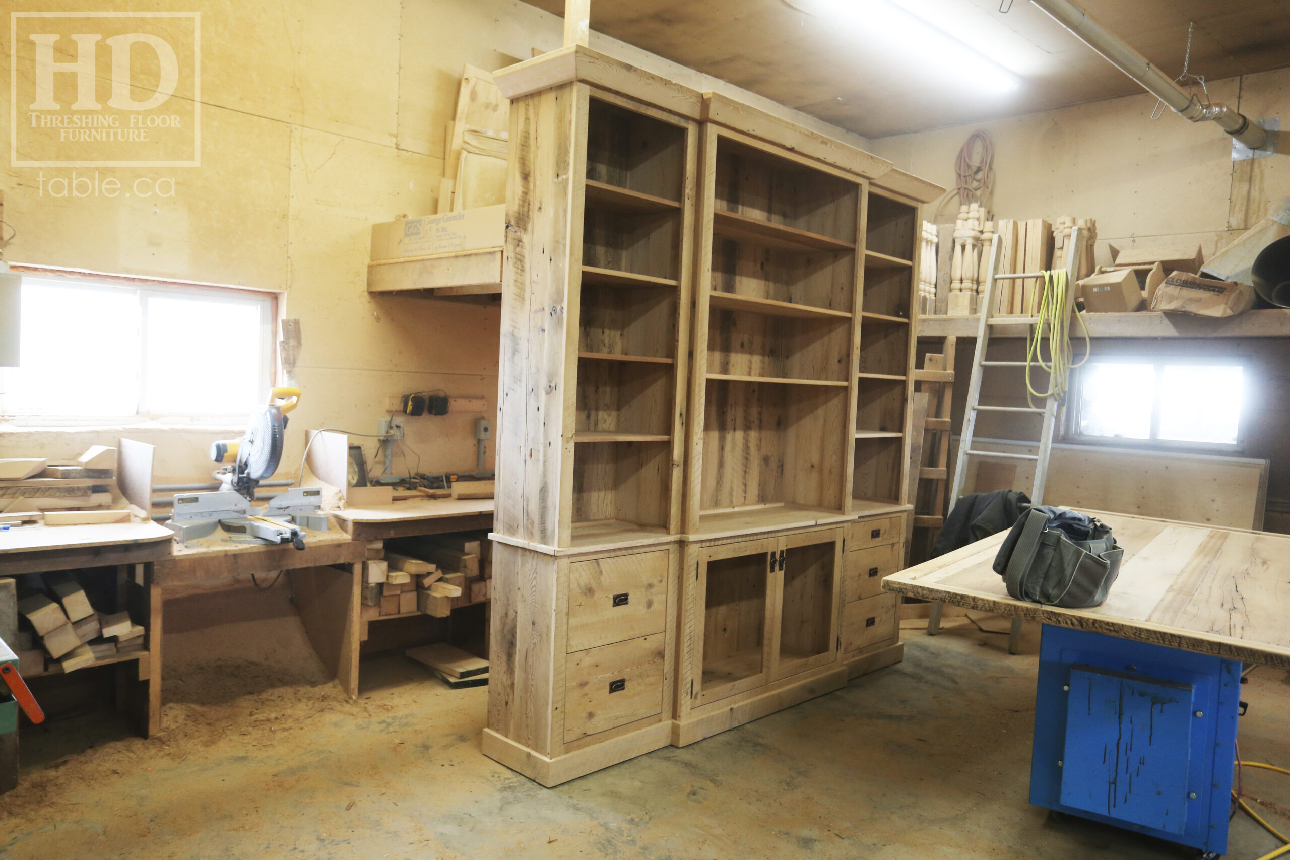 111" Wide Ontario Barnwood Hutch we made for a Torrance cotage - 107" 7/8" height - 16" deep - Centre 45" wide / 18" deep - Outside units proportionally sized - Reclaimed old growth hemlock threshing floor + grainery board construction - Original edges + distressing kept - Lee Valley Hardware - Satin polyurethane finish - www.table.ca