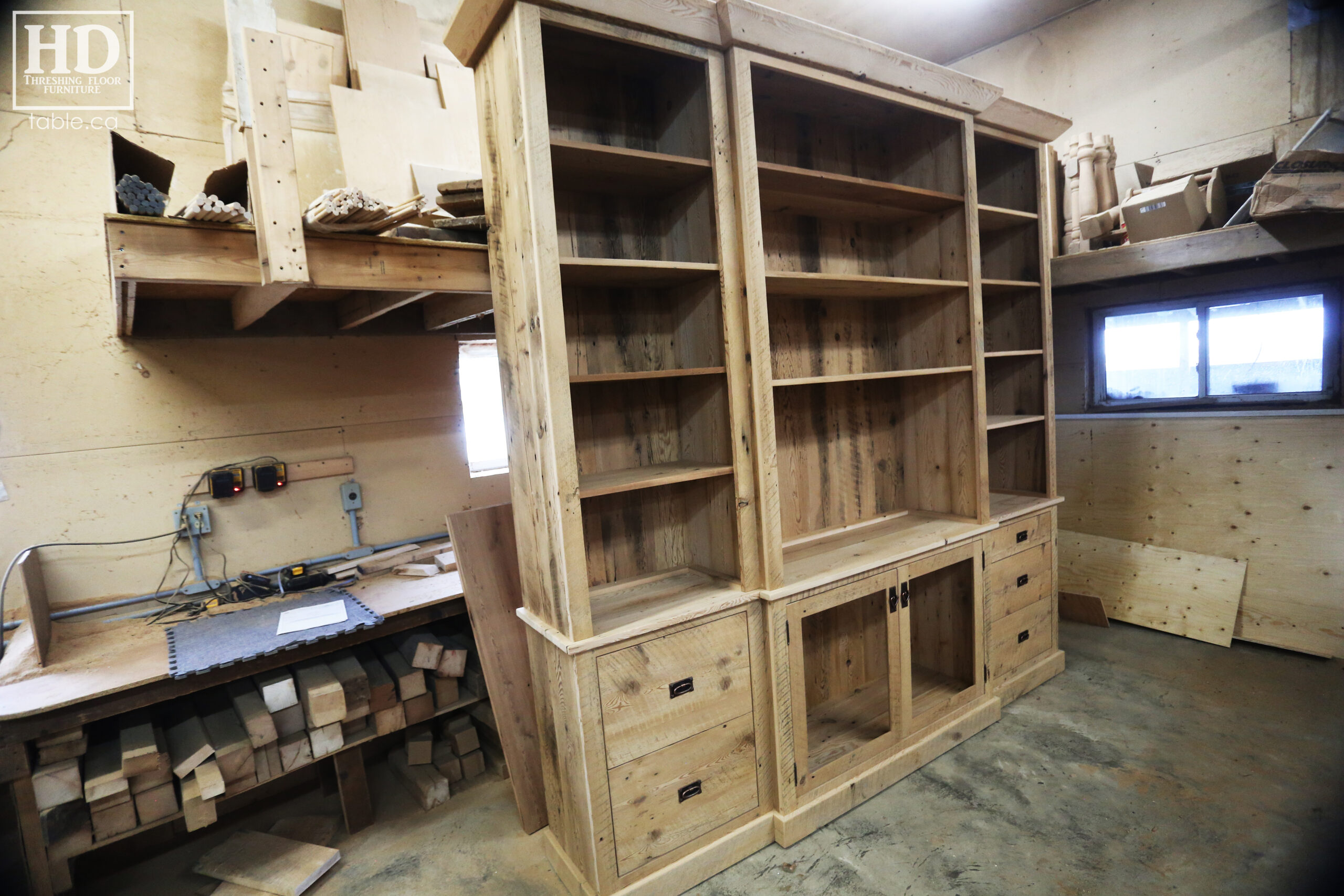 111" Wide Ontario Barnwood Hutch we made for a Torrance cotage - 107" 7/8" height - 16" deep - Centre 45" wide / 18" deep - Outside units proportionally sized - Reclaimed old growth hemlock threshing floor + grainery board construction - Original edges + distressing kept - Lee Valley Hardware - Satin polyurethane finish - www.table.ca