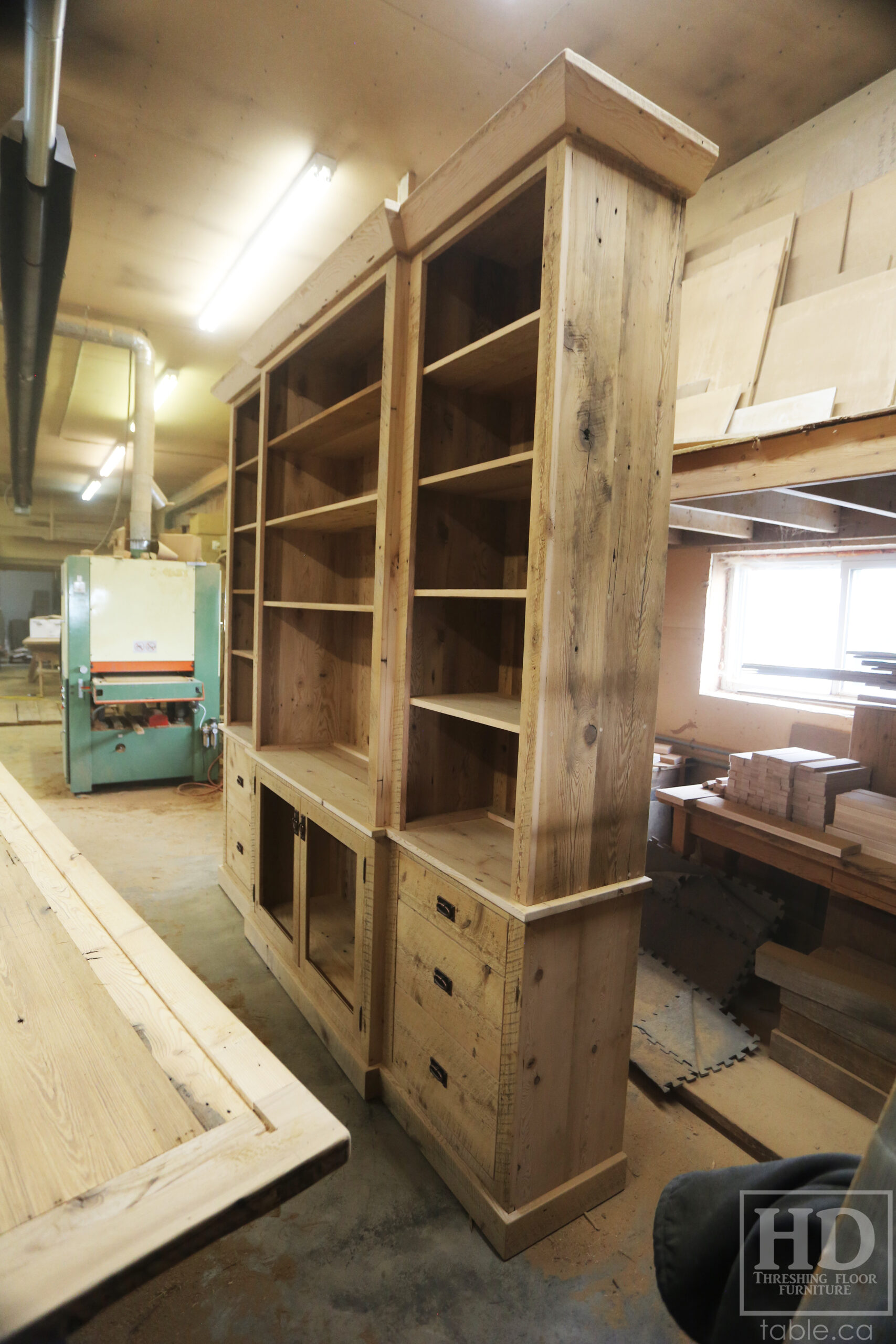 111" Wide Ontario Barnwood Hutch we made for a Torrance cotage - 107" 7/8" height - 16" deep - Centre 45" wide / 18" deep - Outside units proportionally sized - Reclaimed old growth hemlock threshing floor + grainery board construction - Original edges + distressing kept - Lee Valley Hardware - Satin polyurethane finish - www.table.ca