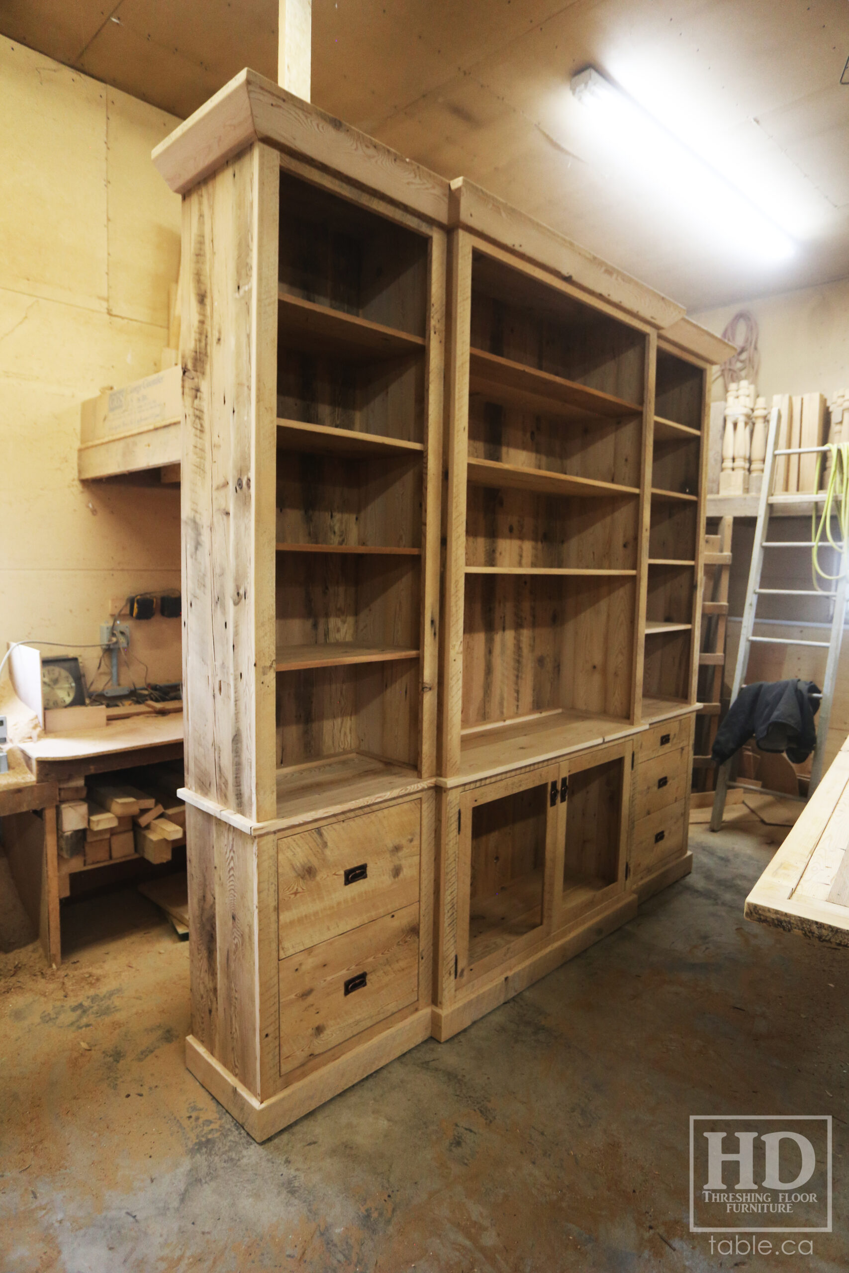 111" Wide Ontario Barnwood Hutch we made for a Torrance cotage - 107" 7/8" height - 16" deep - Centre 45" wide / 18" deep - Outside units proportionally sized - Reclaimed old growth hemlock threshing floor + grainery board construction - Original edges + distressing kept - Lee Valley Hardware - Satin polyurethane finish - www.table.ca