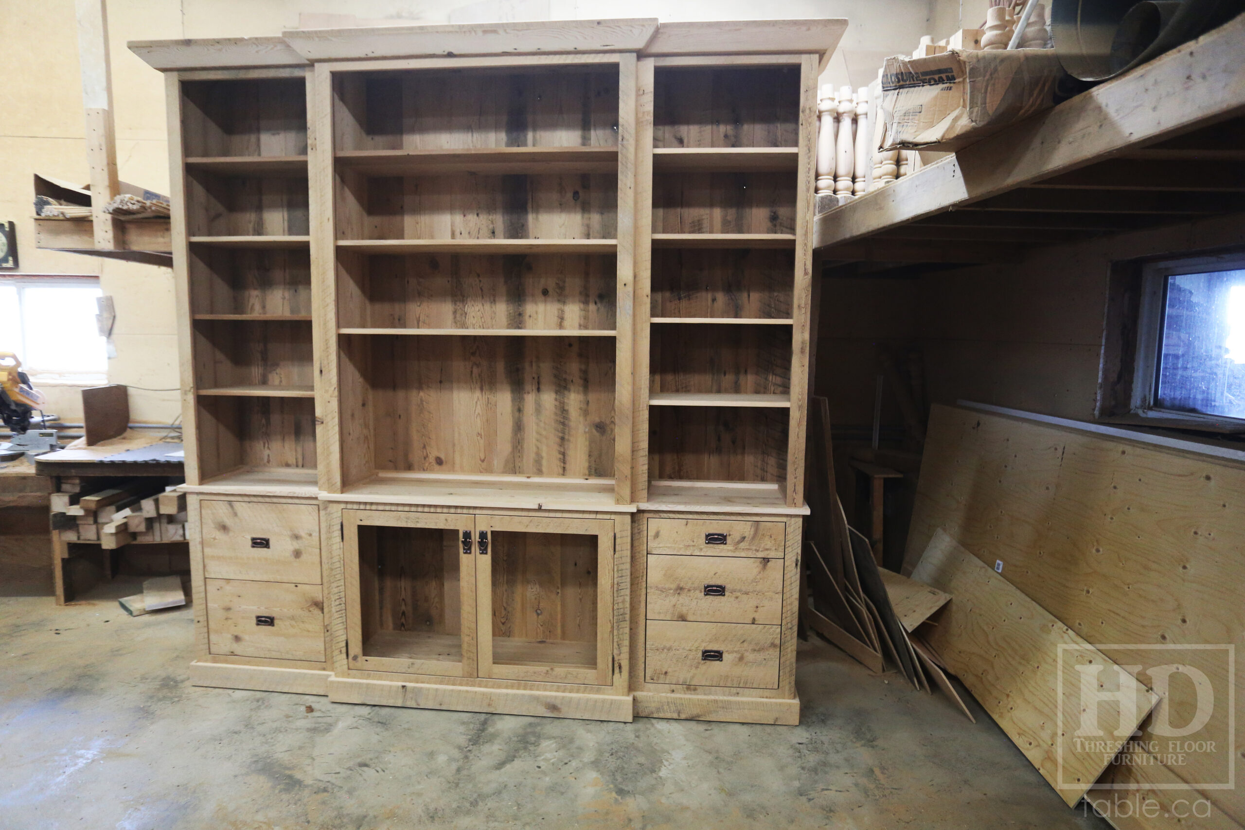 111" Wide Ontario Barnwood Hutch we made for a Torrance cotage - 107" 7/8" height - 16" deep - Centre 45" wide / 18" deep - Outside units proportionally sized - Reclaimed old growth hemlock threshing floor + grainery board construction - Original edges + distressing kept - Lee Valley Hardware - Satin polyurethane finish - www.table.ca