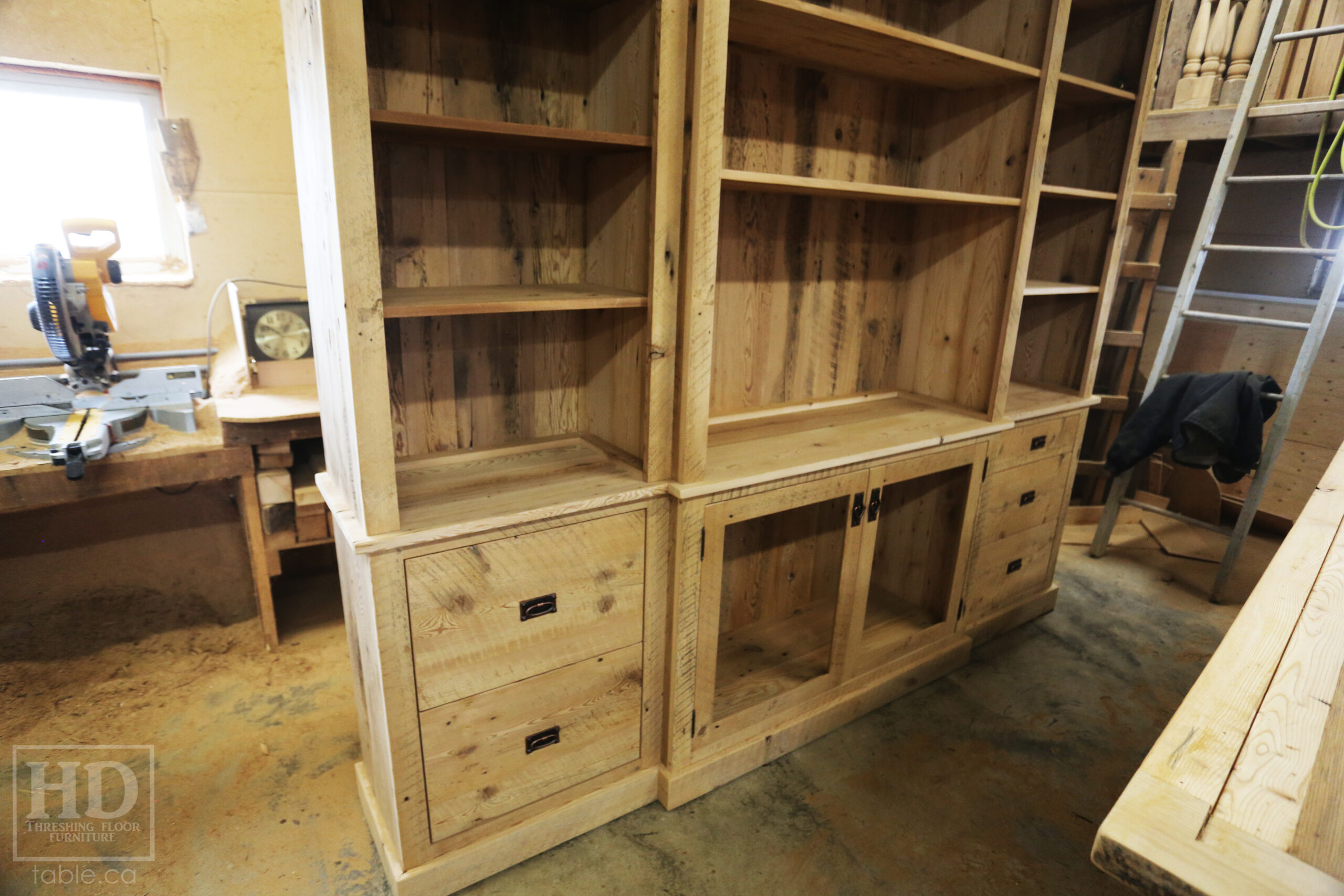 111" Wide Ontario Barnwood Hutch we made for a Torrance cotage - 107" 7/8" height - 16" deep - Centre 45" wide / 18" deep - Outside units proportionally sized - Reclaimed old growth hemlock threshing floor + grainery board construction - Original edges + distressing kept - Lee Valley Hardware - Satin polyurethane finish - www.table.ca