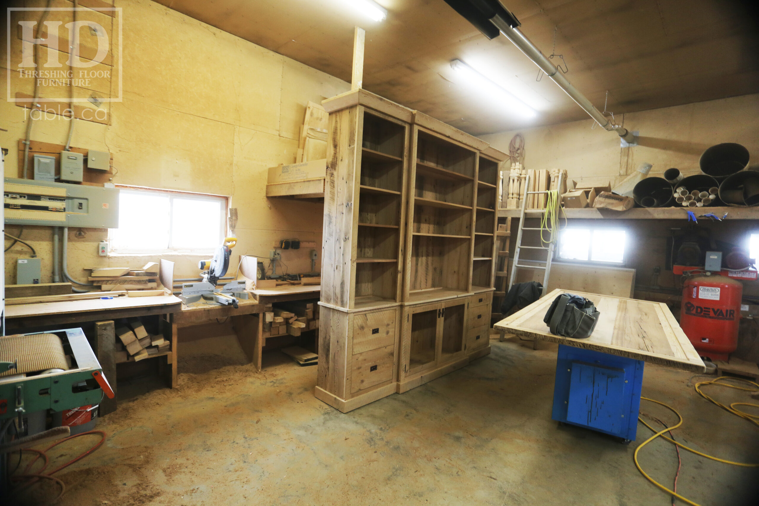 111" Wide Ontario Barnwood Hutch we made for a Torrance cotage - 107" 7/8" height - 16" deep - Centre 45" wide / 18" deep - Outside units proportionally sized - Reclaimed old growth hemlock threshing floor + grainery board construction - Original edges + distressing kept - Lee Valley Hardware - Satin polyurethane finish - www.table.ca