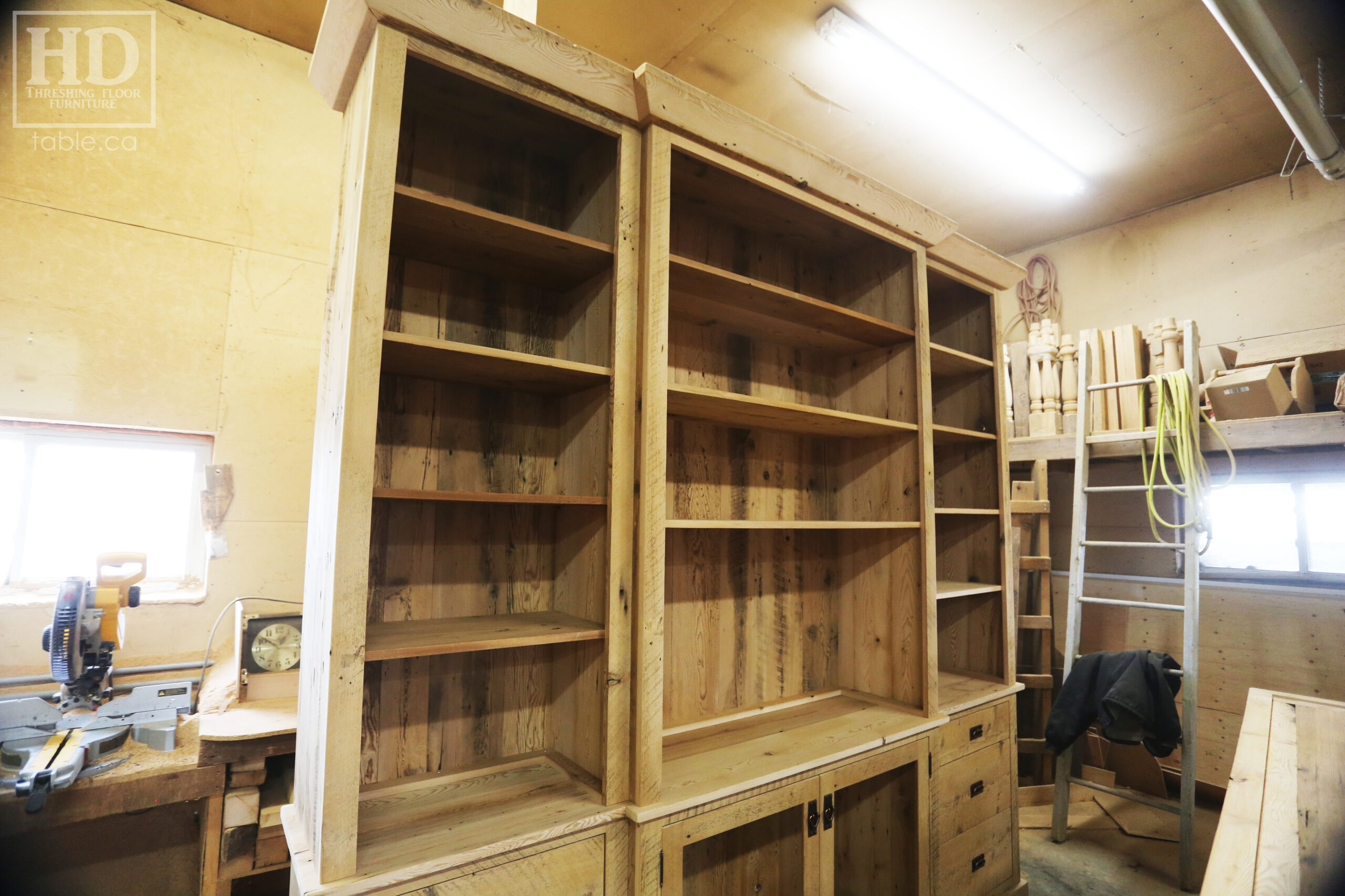 111" Wide Ontario Barnwood Hutch we made for a Torrance cotage - 107" 7/8" height - 16" deep - Centre 45" wide / 18" deep - Outside units proportionally sized - Reclaimed old growth hemlock threshing floor + grainery board construction - Original edges + distressing kept - Lee Valley Hardware - Satin polyurethane finish - www.table.ca