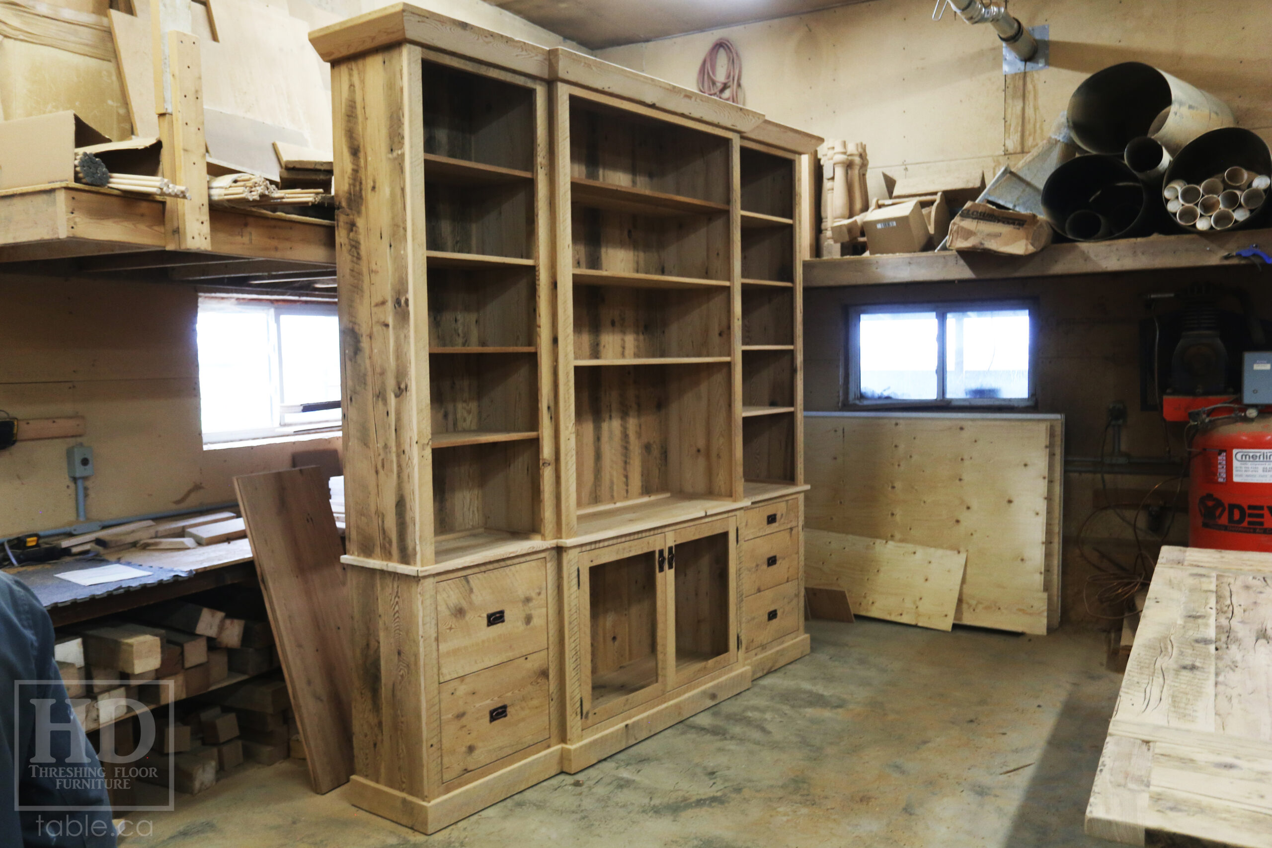 111" Wide Ontario Barnwood Hutch we made for a Torrance cotage - 107" 7/8" height - 16" deep - Centre 45" wide / 18" deep - Outside units proportionally sized - Reclaimed old growth hemlock threshing floor + grainery board construction - Original edges + distressing kept - Lee Valley Hardware - Satin polyurethane finish - www.table.ca 