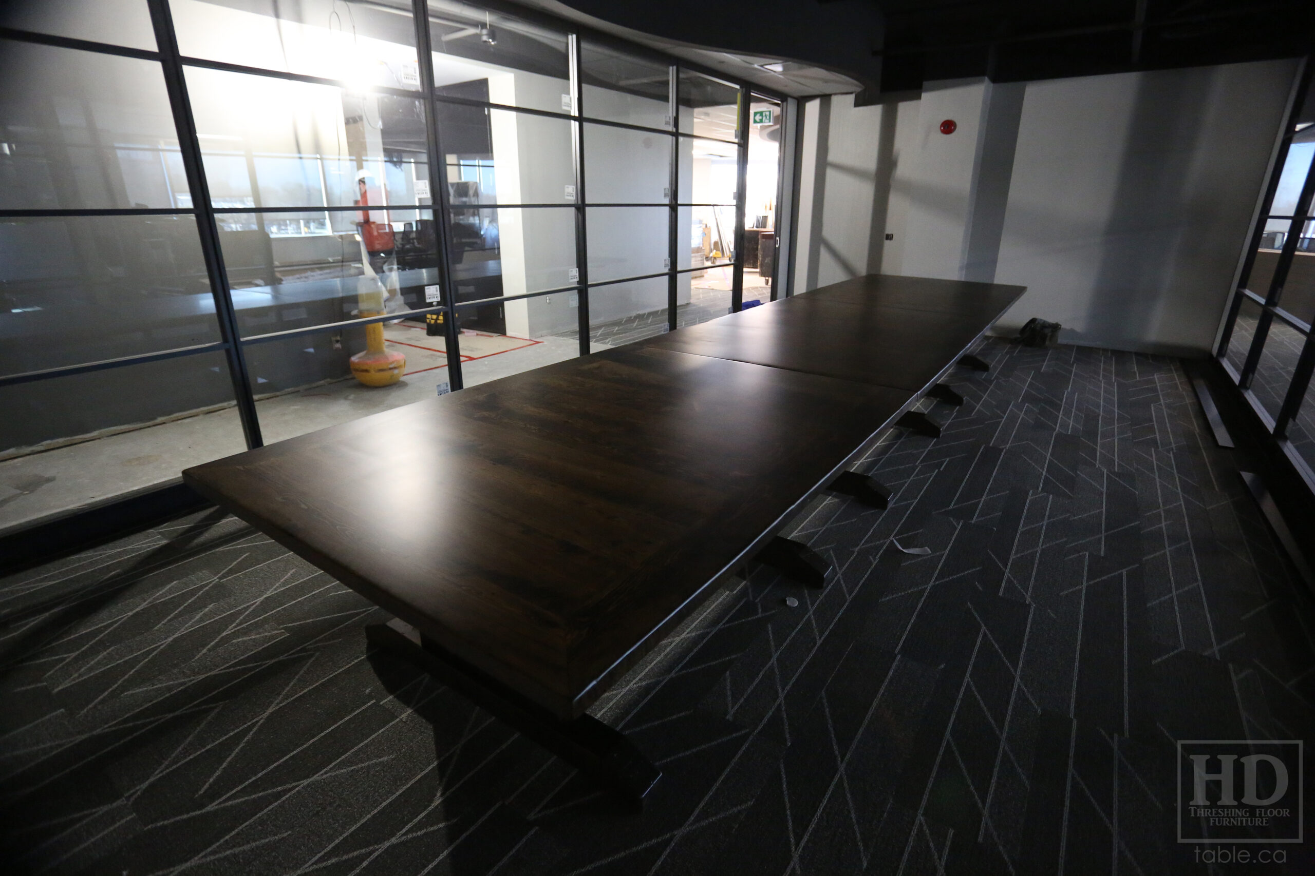 21' Ontario Barnwood Boardroom Table we made for an Ottawa Company - 60" wide - Trestle Base - Old Growth Hemlock Threshing Floor Construction - Onsite final dowling 1/3 1/3 1/3 - 2 Posts Per 1/3 -Original edges & distressing maintained - Black Stain Option - Premium epoxy + matte polyurethane finish  - www.table.ca