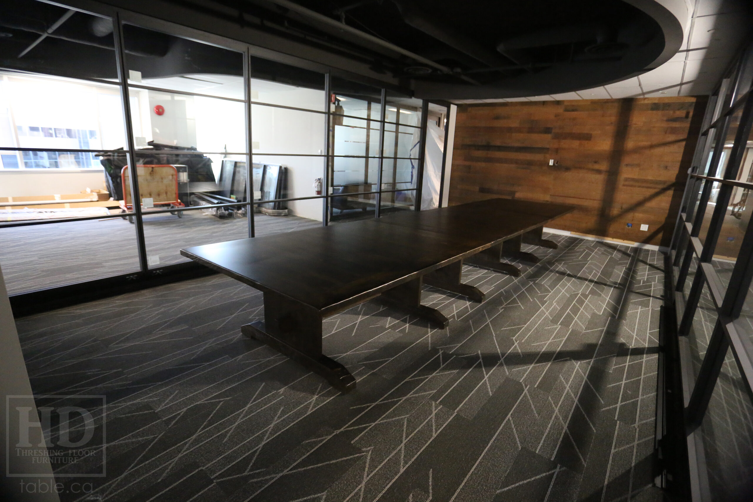 21' Ontario Barnwood Boardroom Table we made for an Ottawa Company - 60" wide - Trestle Base - Old Growth Hemlock Threshing Floor Construction - Onsite final dowling 1/3 1/3 1/3 - 2 Posts Per 1/3 -Original edges & distressing maintained - Black Stain Option - Premium epoxy + matte polyurethane finish  - www.table.ca