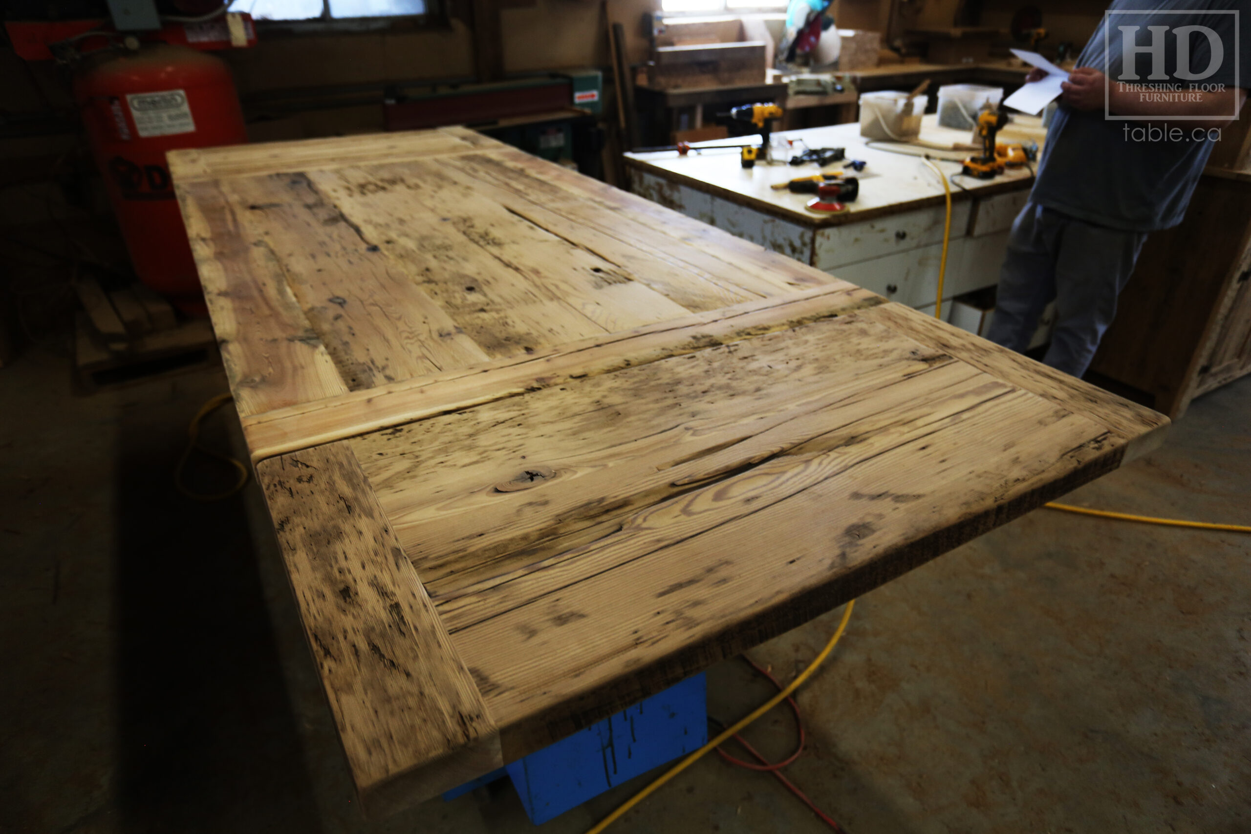 5 1/2' Reclaimed Ontario Barnwood Table we made for a Dundas, Ontario Home - 40" wide - U Shaped Matte Black Metal Base - Old Growth Hemlock Threshing Floor Construction - Original edges & distressing maintained - Premium epoxy + satin polyurethane finish - Two 18" Leaves - www.table.ca