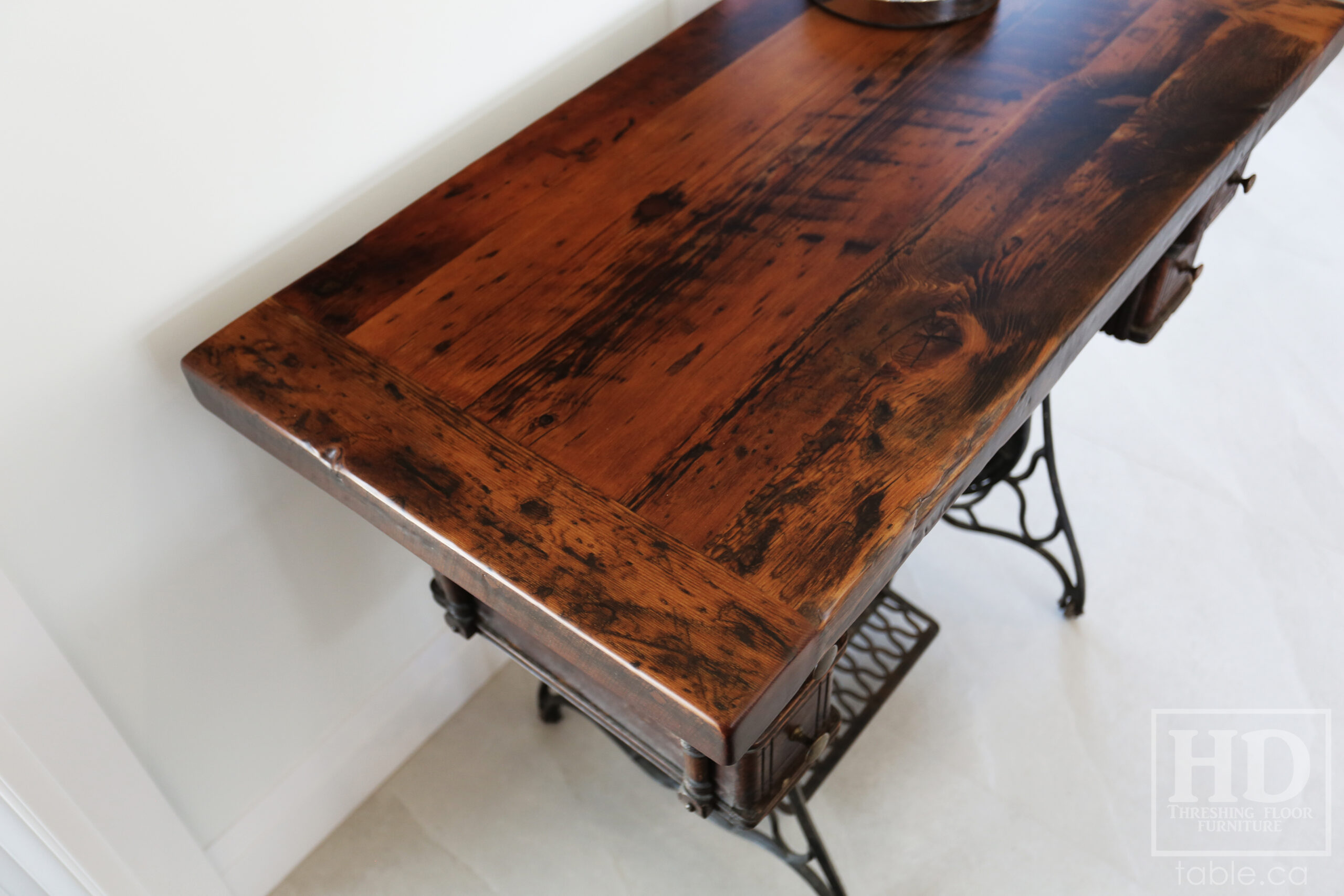 38" 3/4" x 20" Reclaimed Ontario Barnwood Top we made for a customer's antique Singer Sewing Machine base - Hemlock Threshing Floor Construction - Original edges & distressing maintained - Bread Board Ends - Premium epoxy + matte polyurethane finish / www.table.ca