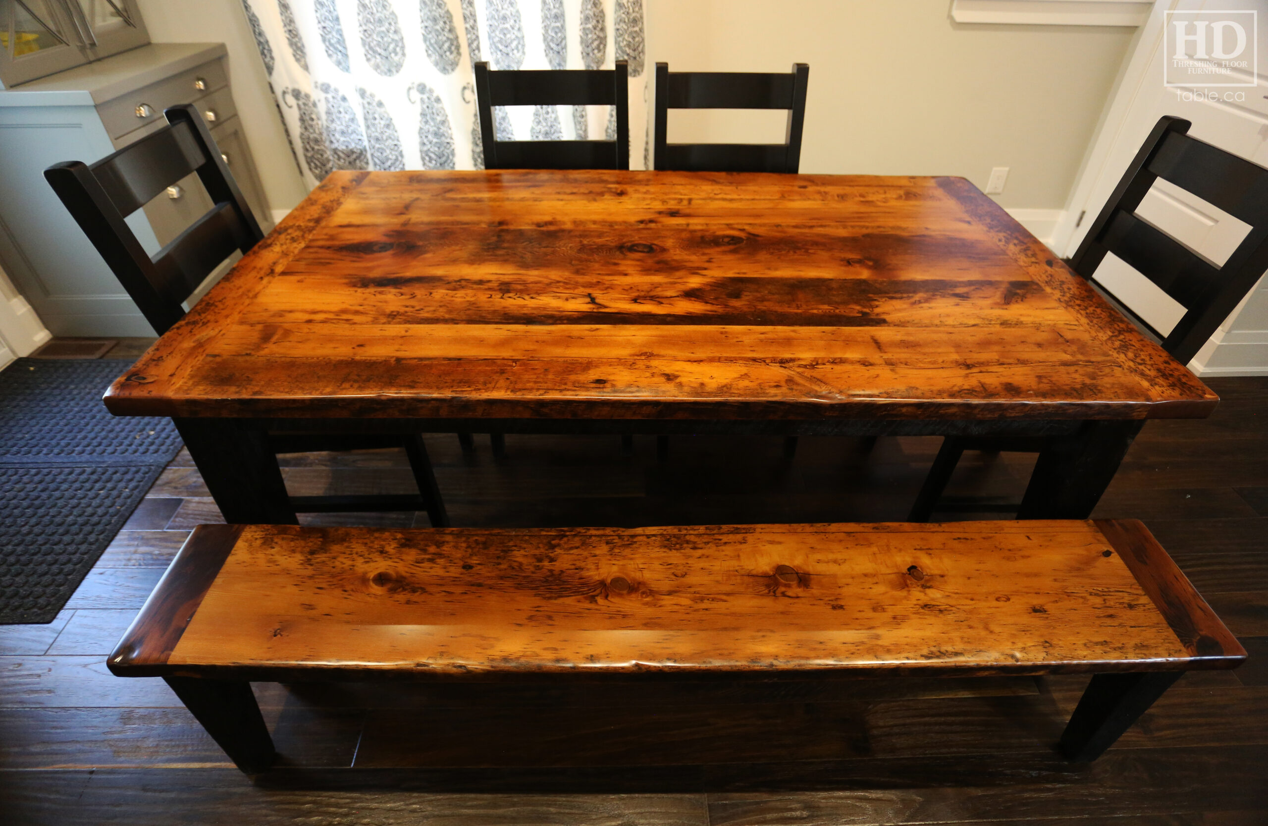 6' Reclaimed Ontario Barnwood Table we made for a Brampton home - 42" deep - Harvest Base: Tapered Windbrace Beam Legs - Black Painted Base - Old Growth Hemlock Threshing Floor Construction - Original edges & distressing maintained - Premium epoxy + satin polyurethane finish – 6' [matching] Bench - 4 Ladder Back Chairs / Wormy Maple / Black Painted Frame – Seat Stained Colour of Table - www.table.ca