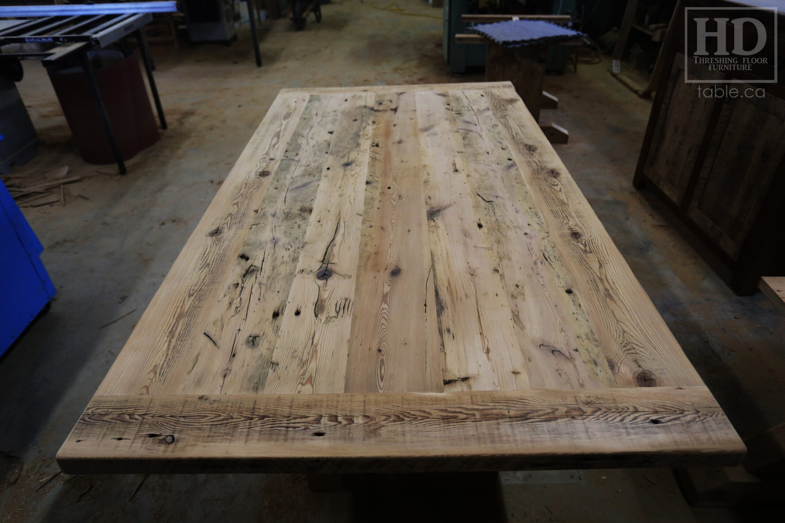 6.5' Ontario Barnwood Table we made for a Brantford Home - 42" wide - Modern Plank Posts Base - Old Growth Hemlock Threshing Floor Construction - Original edges & distressing maintained - Bleached Option - Premium epoxy + satin polyurethane finish - www.table.ca