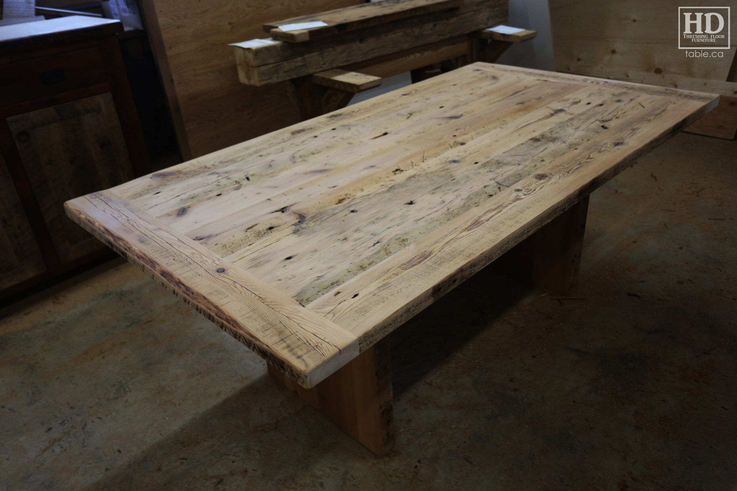 6.5' Ontario Barnwood Table we made for a Brantford Home - 42" wide - Modern Plank Posts Base - Old Growth Hemlock Threshing Floor Construction - Original edges & distressing maintained - Bleached Option - Premium epoxy + satin polyurethane finish - www.table.ca