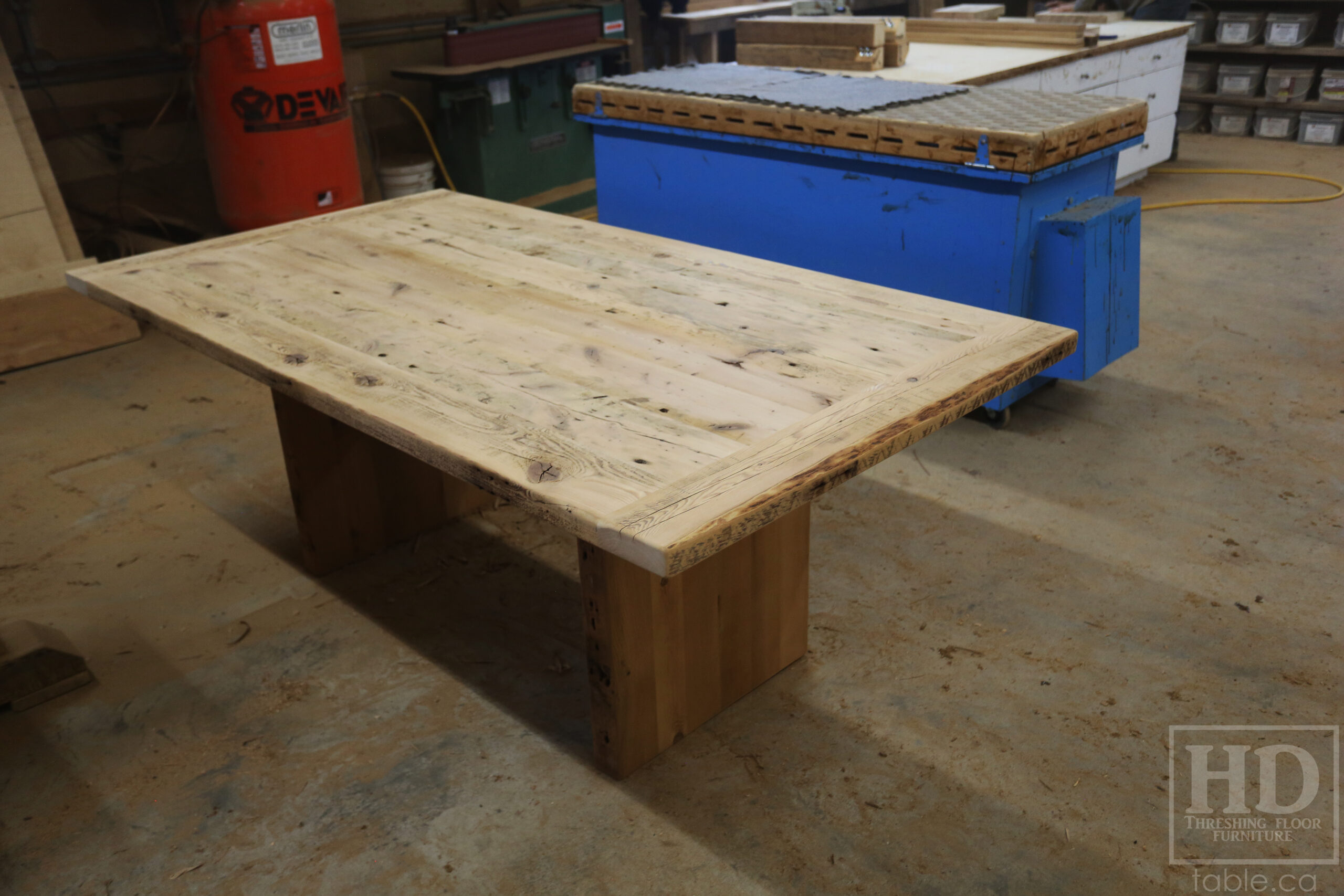 6.5' Ontario Barnwood Table we made for a Brantford Home - 42" wide - Modern Plank Posts Base - Old Growth Hemlock Threshing Floor Construction - Original edges & distressing maintained - Bleached Option - Premium epoxy + satin polyurethane finish - www.table.ca