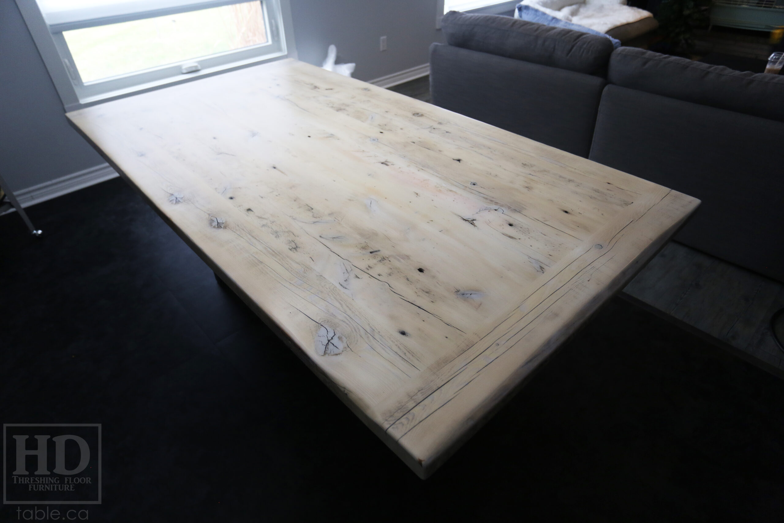 6.5' Ontario Barnwood Table we made for a Brantford Home - 42" wide - Modern Plank Posts Base - Old Growth Hemlock Threshing Floor Construction - Original edges & distressing maintained - Bleached Option - Premium epoxy + satin polyurethane finish - www.table.ca