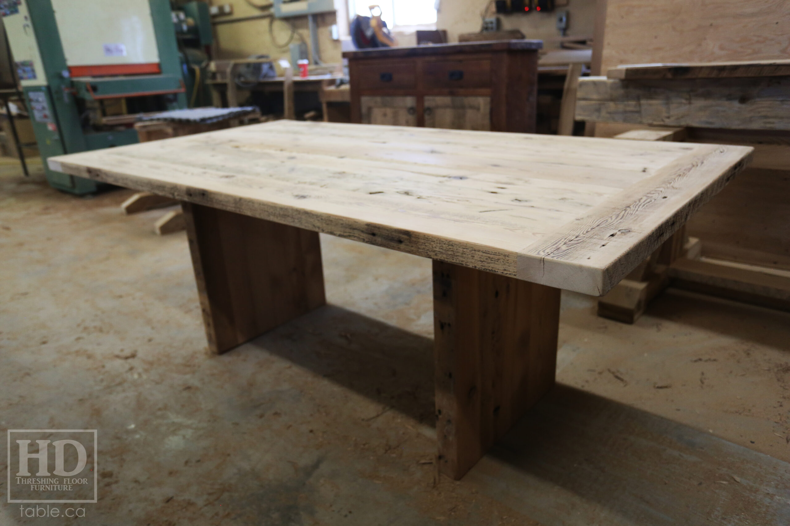 6.5' Ontario Barnwood Table we made for a Brantford Home - 42" wide - Modern Plank Posts Base - Old Growth Hemlock Threshing Floor Construction - Original edges & distressing maintained - Bleached Option - Premium epoxy + satin polyurethane finish - www.table.ca