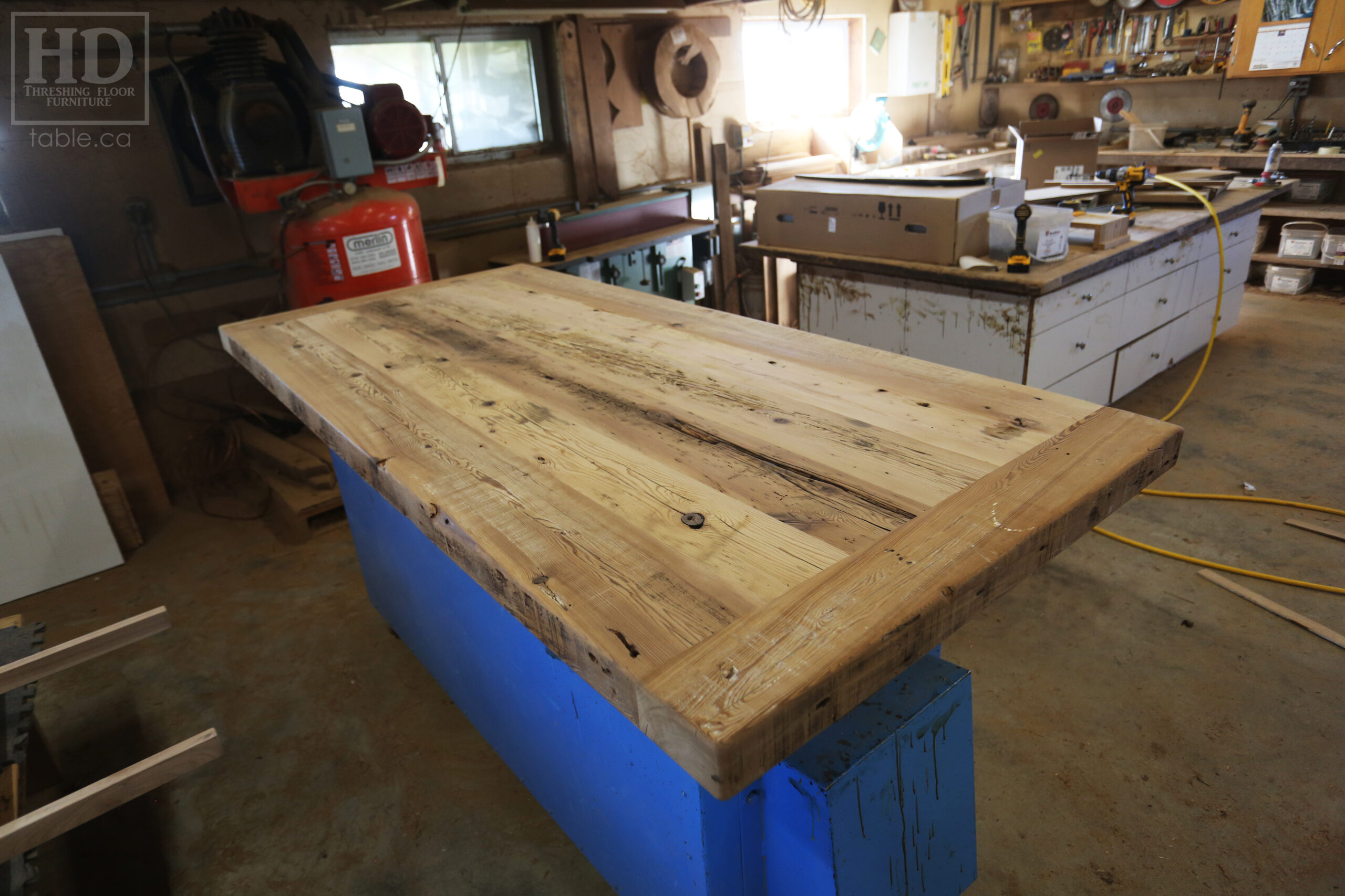 7' Reclaimed Ontario Barnwood Table we made for a Goderich home - 39" wide - 36" height - 3" Joist Material Top Option - Metal U Shaped Matte Black Base - Old Growth Hemlock Threshing Floor Construction - Original edges & distressing maintained - Premium epoxy + satin polyurethane finish - Two 18" Leaves - www.table.ca