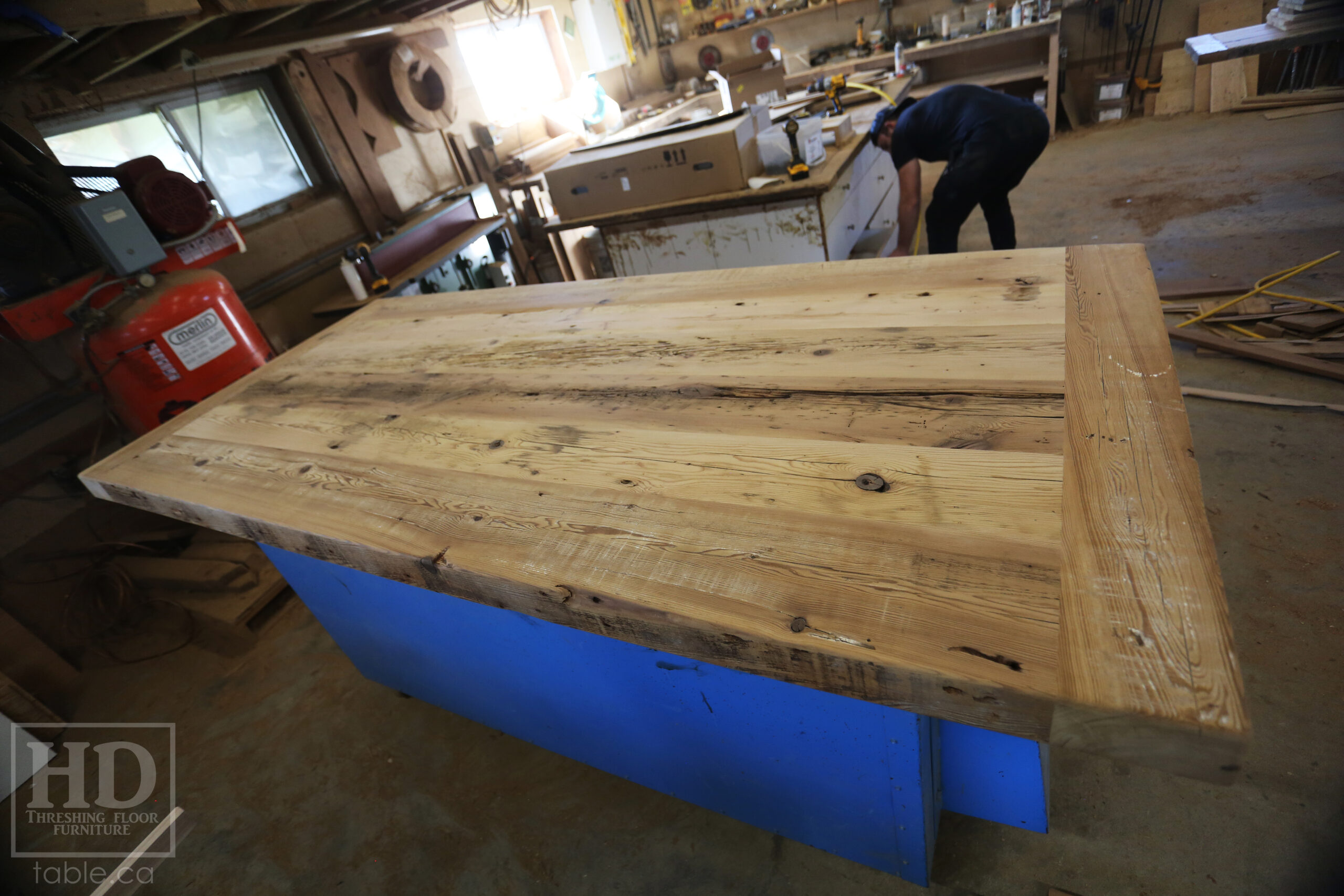 7' Reclaimed Ontario Barnwood Table we made for a Goderich home - 39" wide - 36" height - 3" Joist Material Top Option - Metal U Shaped Matte Black Base - Old Growth Hemlock Threshing Floor Construction - Original edges & distressing maintained - Premium epoxy + satin polyurethane finish - Two 18" Leaves - www.table.ca