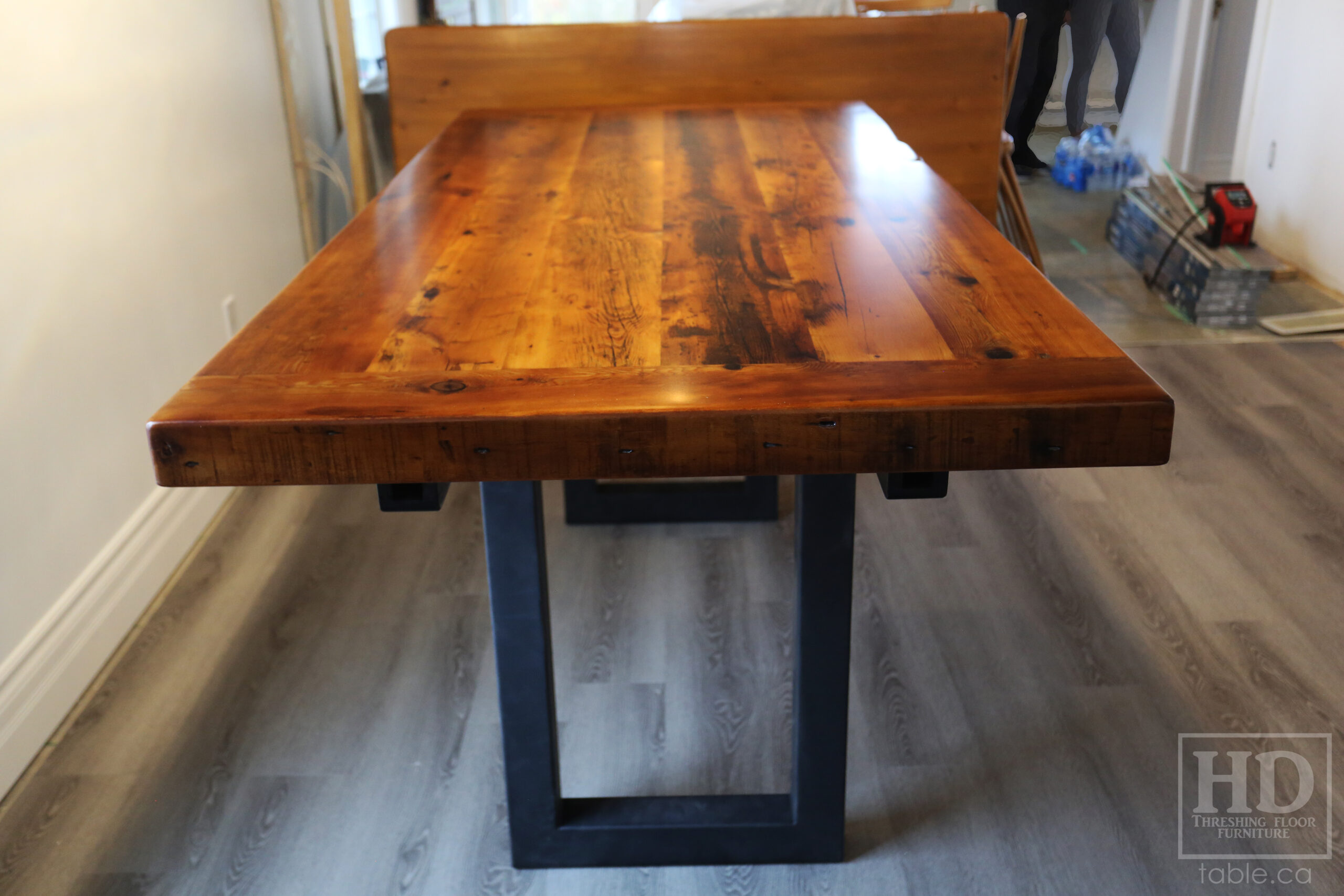 7' Reclaimed Ontario Barnwood Table we made for a Goderich home - 39" wide - 36" height - 3" Joist Material Top Option - Metal U Shaped Matte Black Base - Old Growth Hemlock Threshing Floor Construction - Original edges & distressing maintained - Premium epoxy + satin polyurethane finish - Two 18" Leaves - www.table.ca