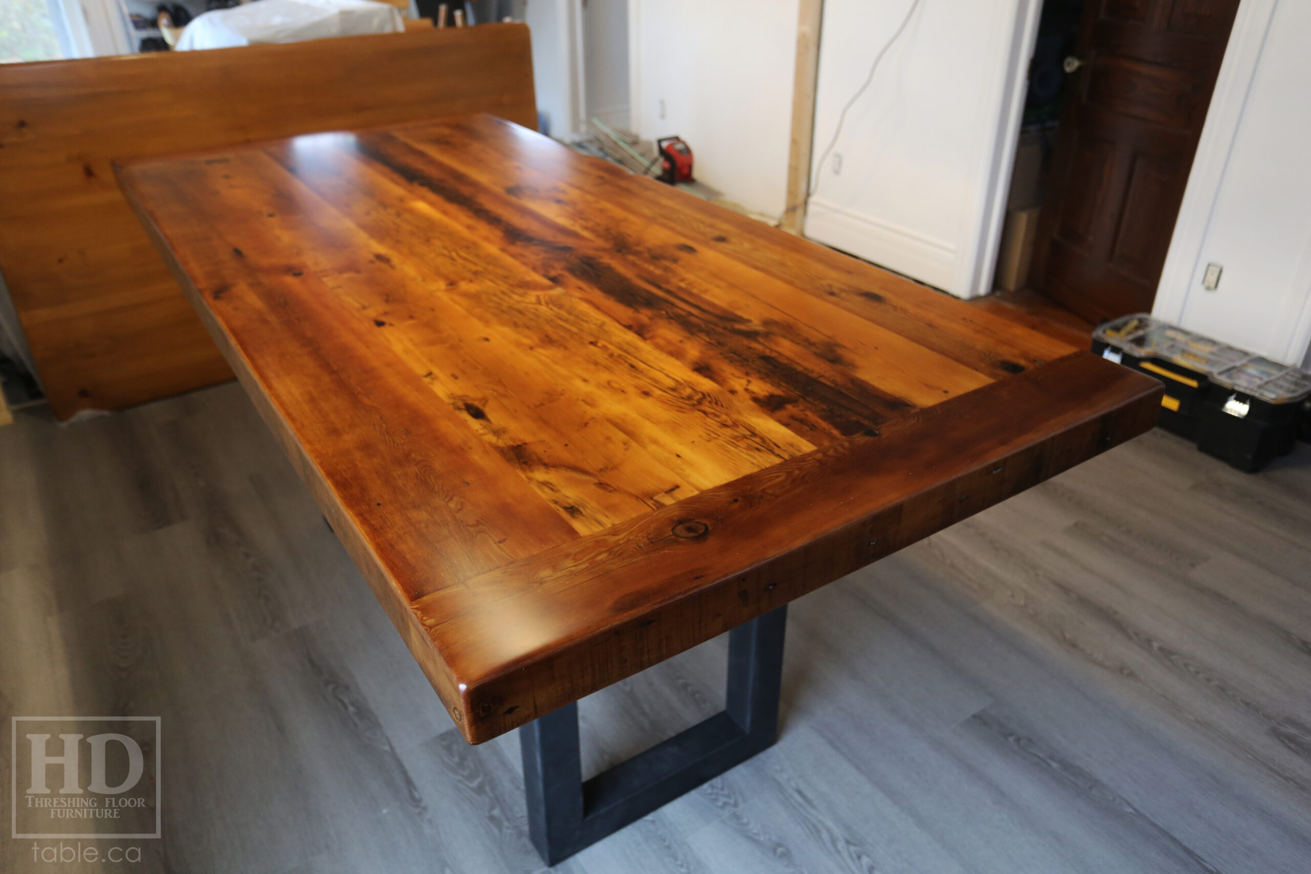 7' Reclaimed Ontario Barnwood Table we made for a Goderich home - 39" wide - 36" height - 3" Joist Material Top Option - Metal U Shaped Matte Black Base - Old Growth Hemlock Threshing Floor Construction - Original edges & distressing maintained - Premium epoxy + satin polyurethane finish - Two 18" Leaves - www.table.ca