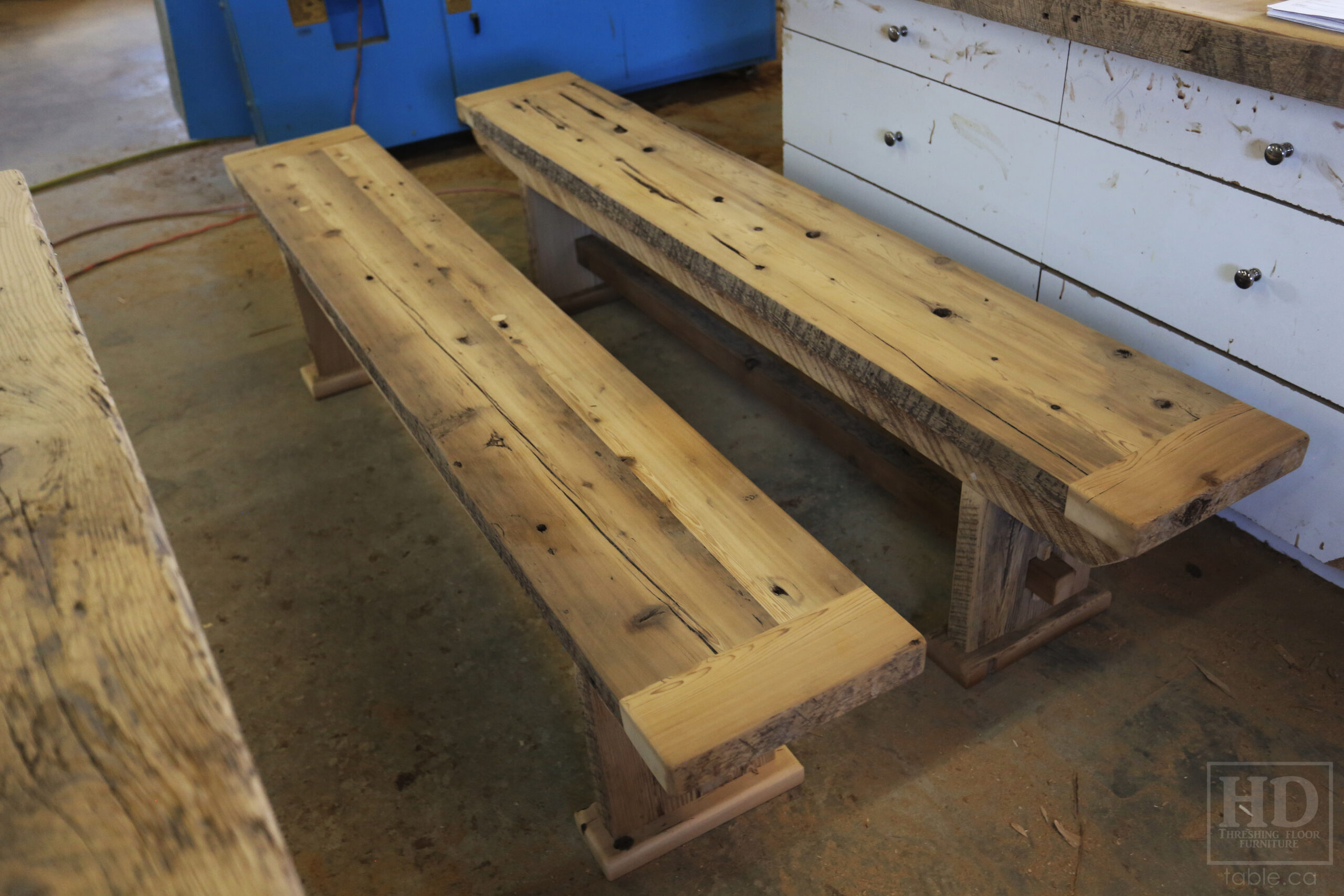 6.5' Reclaimed Ontario Barnwood Table we made for a Grismby home - 36" deep - Trestle Base - Old Growth Hemlock Threshing Floor Construction - Original edges & distressing maintained - Black Stain Option - Premium epoxy + matte polyurethane finish - [2] Matching 6.5' Benches - [2] Plank Back Chairs / Wormy Maple - www.table.ca