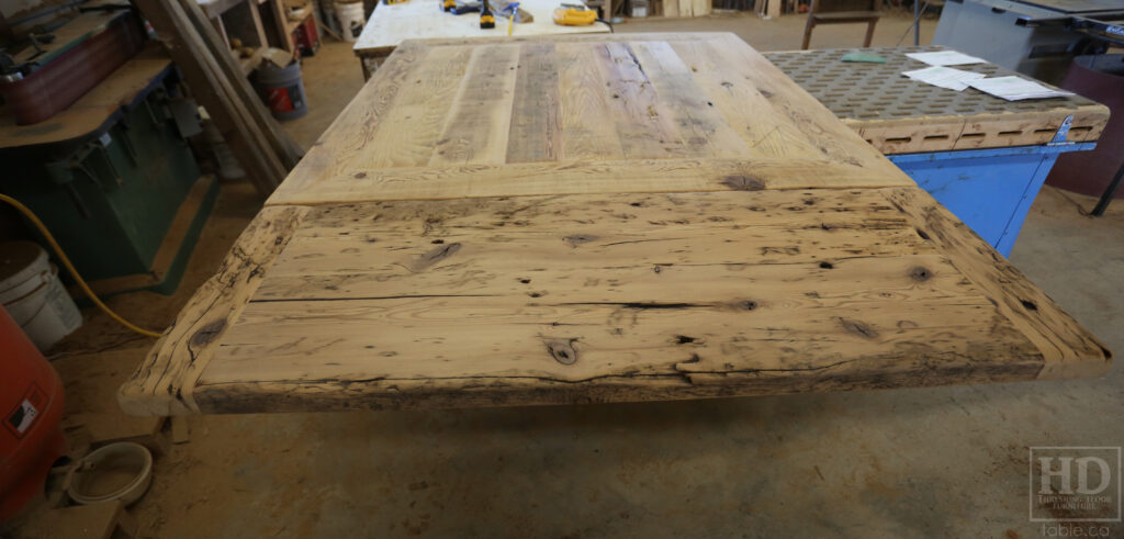 50" x 50" Ontario Barnwood Table we made for a Toronto Company - X Shaped Metal Base - Mitred Corners - Reclaimed Old Growth Hemlock Threshing Floor Construction - Original edges & distressing maintained - Premium epoxy + satin polyurethane finish  - One 18" Leaf Extension - www.table.ca
