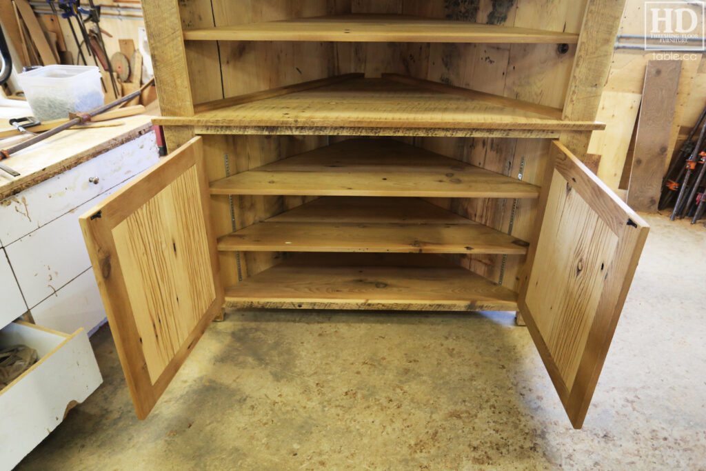 Reclaimed Ontario Barnwood Corner Hutch we made for a Vienna home - 7' Height / 3'10" Wide - Bottom Doors/ Top Shelving - Old Growth Pine Threshing Floor + Grainery Board Construction - Original edges & distressing maintained - Mission Cast Brass Lee Valley Hardware - Polyurethane clearcoat finish - www.table.ca