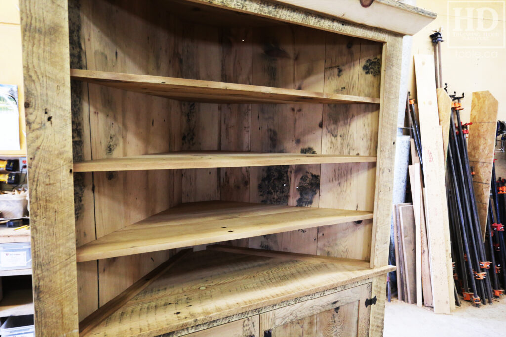 Reclaimed Ontario Barnwood Corner Hutch we made for a Vienna home - 7' Height / 3'10" Wide - Bottom Doors/ Top Shelving - Old Growth Pine Threshing Floor + Grainery Board Construction - Original edges & distressing maintained - Mission Cast Brass Lee Valley Hardware - Polyurethane clearcoat finish - www.table.ca