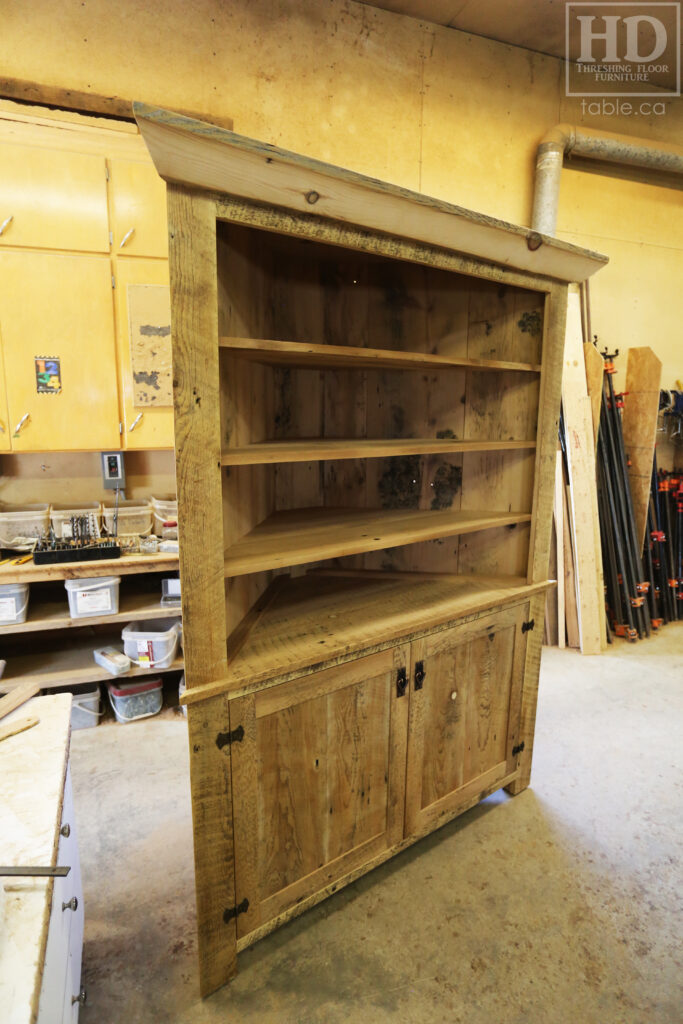 Reclaimed Ontario Barnwood Corner Hutch we made for a Vienna home - 7' Height / 3'10" Wide - Bottom Doors/ Top Shelving - Old Growth Pine Threshing Floor + Grainery Board Construction - Original edges & distressing maintained - Mission Cast Brass Lee Valley Hardware - Polyurethane clearcoat finish - www.table.ca