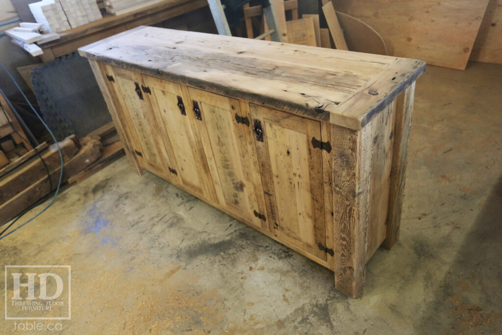 6' Ontario Barnwood Buffet we made for a Sudbury home - 36" height - 18" deep - 4 Doors - Adjustable Shelving Inside - Straight 4"x4" Windbrace Beam Corners - Reclaimed Old Growth Hemlock Threshing Floor + Grainery Board Construction - Original edges + distressing kept - Mission Cast Brass Lee Valley Hardware - Premium epoxy + matte polyurethane finish - www.table.ca