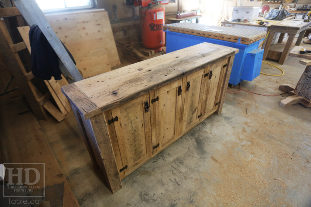 6' Ontario Barnwood Buffet we made for a Sudbury home - 36" height - 18" deep - 4 Doors - Adjustable Shelving Inside - Straight 4"x4" Windbrace Beam Corners - Reclaimed Old Growth Hemlock Threshing Floor + Grainery Board Construction - Original edges + distressing kept - Mission Cast Brass Lee Valley Hardware - Premium epoxy + matte polyurethane finish - www.table.ca