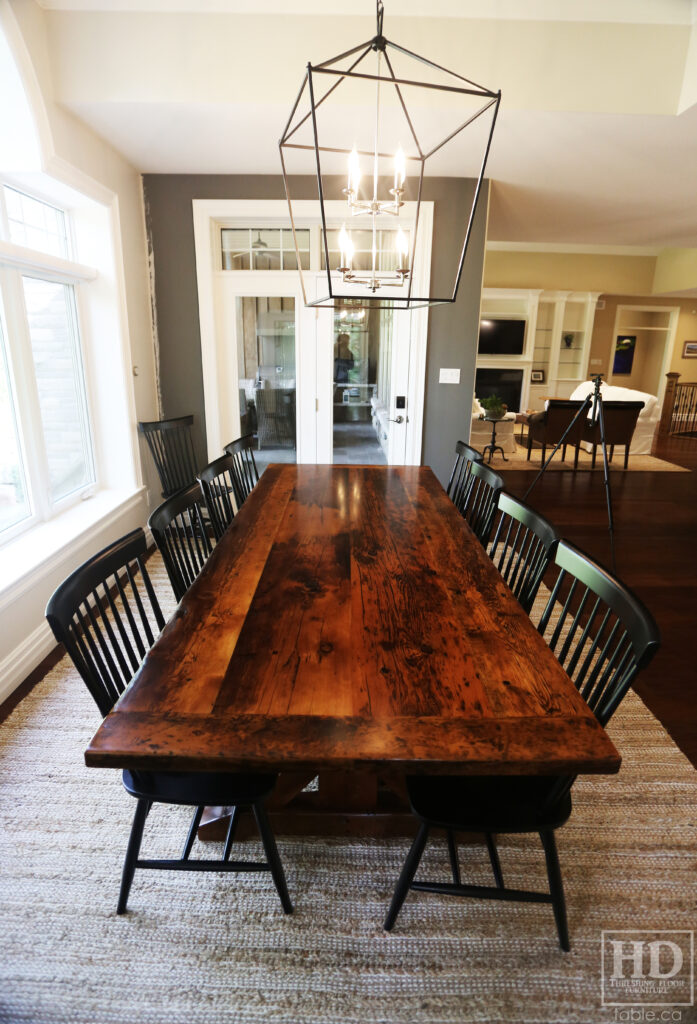 8.5' Reclaimed Ontario Barnwood Table we made for a Grand Bend, Ontario home - 42" wide - Sawbuck Base Option - Old Growth Hemlock Threshing Floor Construction - Original edges & distressing maintained - Premium epoxy + satin polyurethane finish - Solid Black Painted Wormy Maple Shaker Chairs - www.table.ca