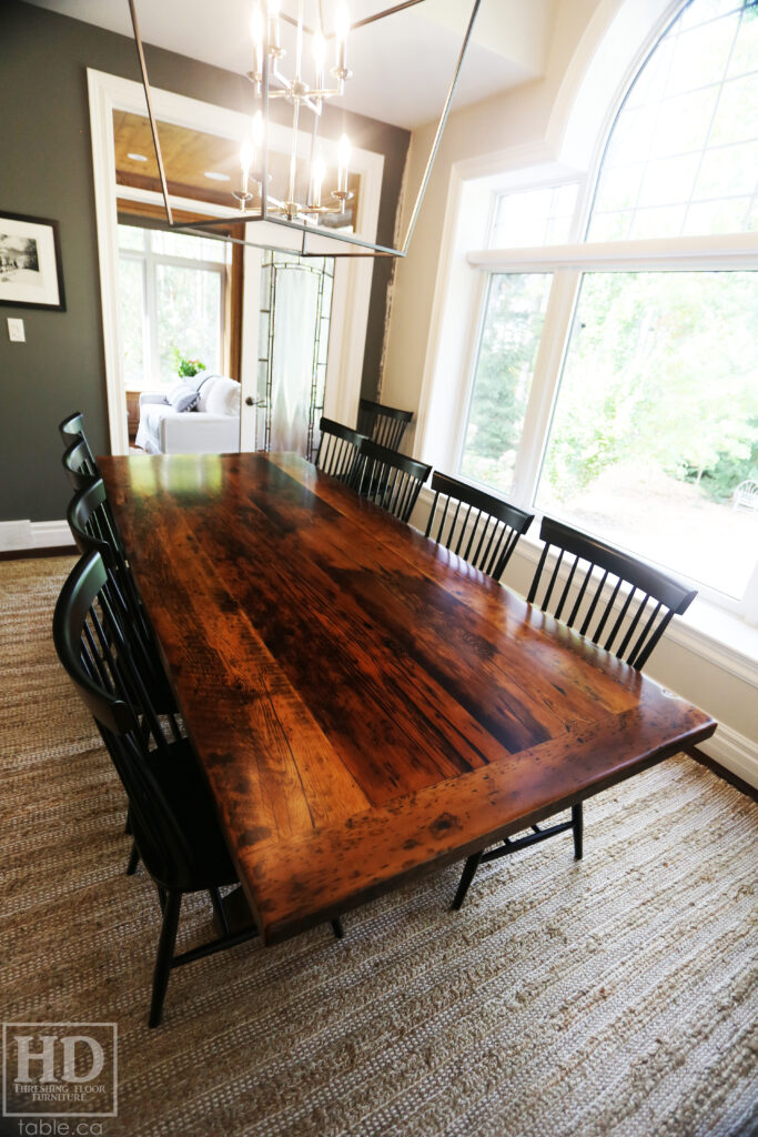 8.5' Reclaimed Ontario Barnwood Table we made for a Grand Bend, Ontario home - 42" wide - Sawbuck Base Option - Old Growth Hemlock Threshing Floor Construction - Original edges & distressing maintained - Premium epoxy + satin polyurethane finish - Solid Black Painted Wormy Maple Shaker Chairs - www.table.ca