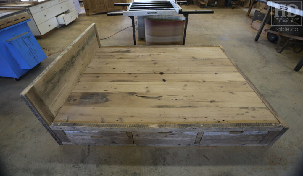 Ontario Barnwood Queen Sized Platform Bed - Reclaimed 2" Hemlock Threshing Floor Construction - Bottom Drawers / notch out handles - Built-in swivel end table platforms - Polyurethane clearcoat finish - www.table.ca