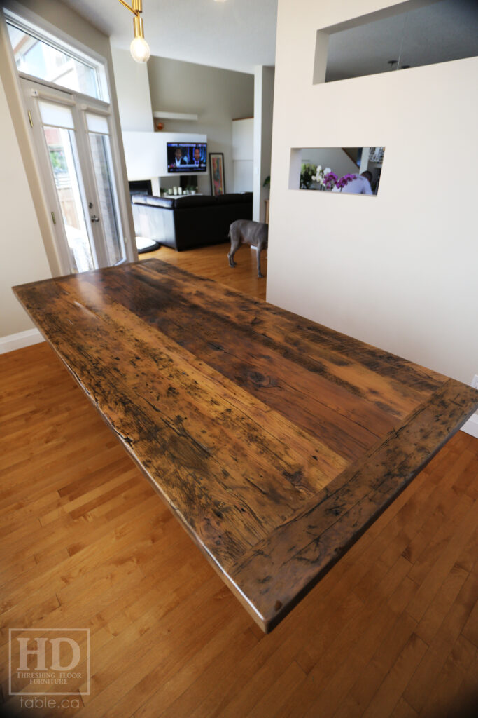 8' Reclaimed Ontario Barnwood Table we made for a Breslau home - 42" wide - Barn Joist Plank Base Option - Old Growth Hemlock Threshing Floor Construction - Original edges & distressing maintained - Premium epoxy + satin polyurethane finish - Greytone Option - www.table.ca