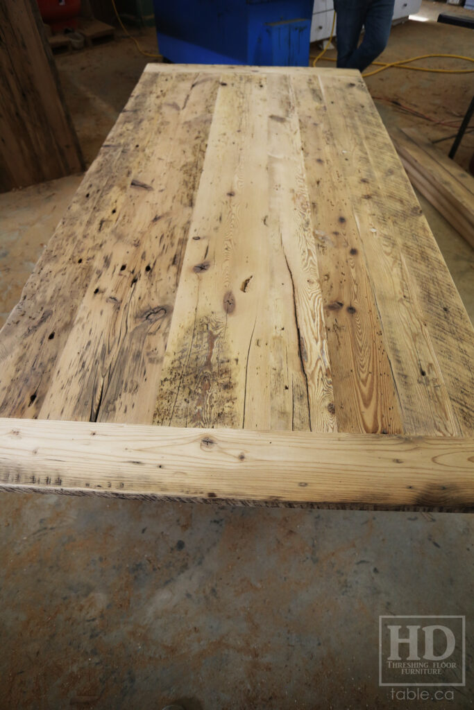 7' Reclaimed Ontario Barnwood Table we made for a Rockwood home - 42" wide - Customized Sawbuck Base - Old Growth Hemlock Threshing Floor Construction - Bread Board Ends - Original edges & distressing maintained - Greytone Option - Premium epoxy + satin polyurethane finish - www.table.ca