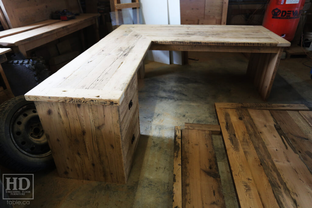 84" Ontario Barnwood Desk we made for a Toronto office - 40" deep - 96" Return / 24" deep - Gable End - Corner Post - 2 drawers on return side - Reclaimed Old Growth Hemlock Threshing Floor + Grainery Board Construction - Original edges + distressing maintained - Mission Cast Brass Lee Valley Hardware - Premium epoxy + satin polyurethane finish - www.table.ca