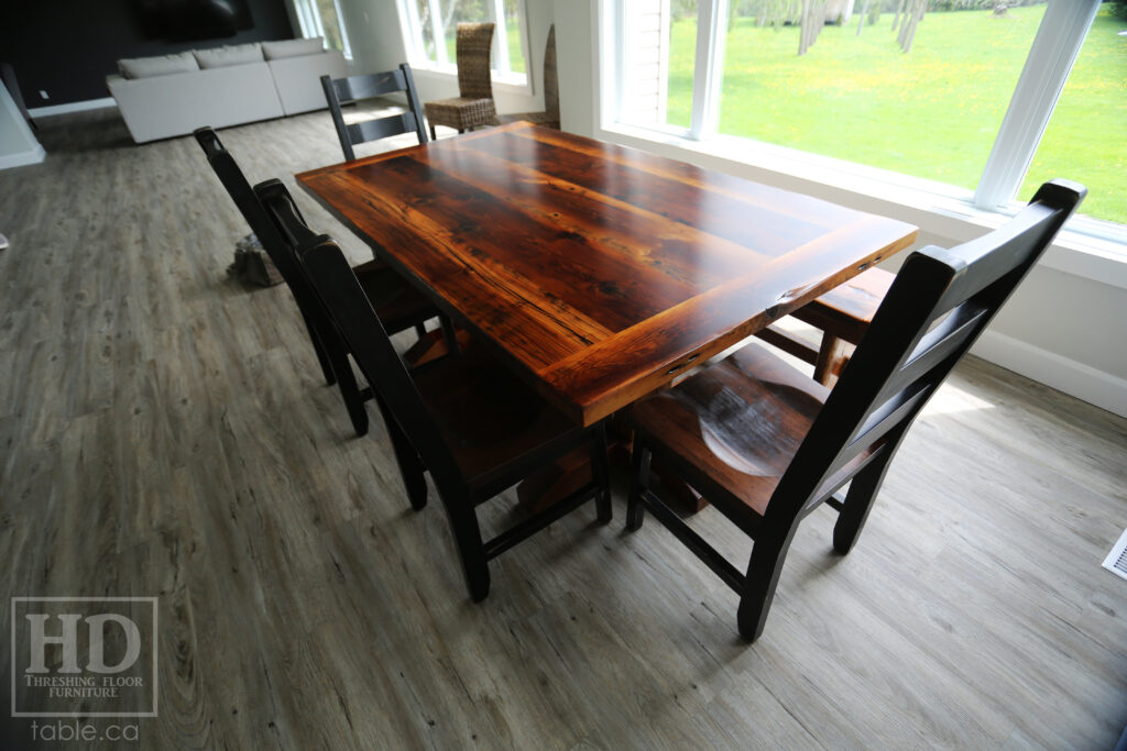 7' Ontario Barnwood Table we made for a Mount Forest Home - 42" wide - Hand Hewn Pedestals Base - Old Growth Hemlock Threshing Floor Construction - Original edges & distressing maintained - Premium epoxy + satin polyurethane finish - 6' [matching] Trestle Bench - 4 Ladder Back Chairs / Wormy Maple - www.table.ca