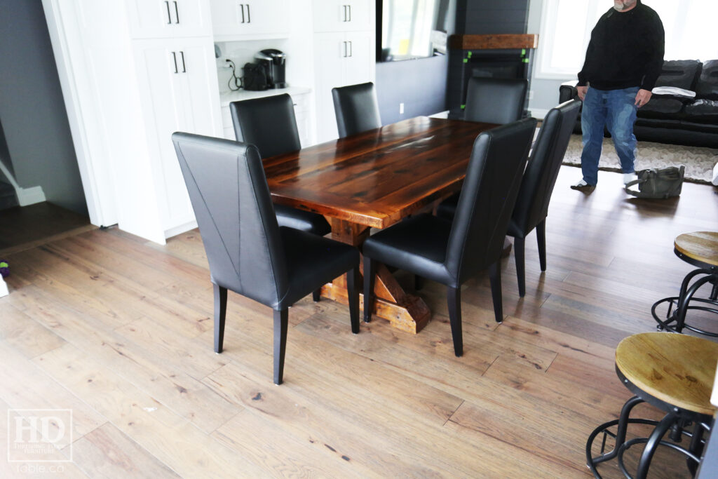 7' Reclaimed Ontario Barnwood Table we made for a Breslau home - 42" wide - Sawbuck Base [Beam Type Option] - Hemlock Threshing Floor Construction - Original edges & distressing maintained - Premium epoxy + satin polyurethane finish - One 18" Leaf - [6] V Back Topgrain Leather Parsons Chairs - www.table.ca