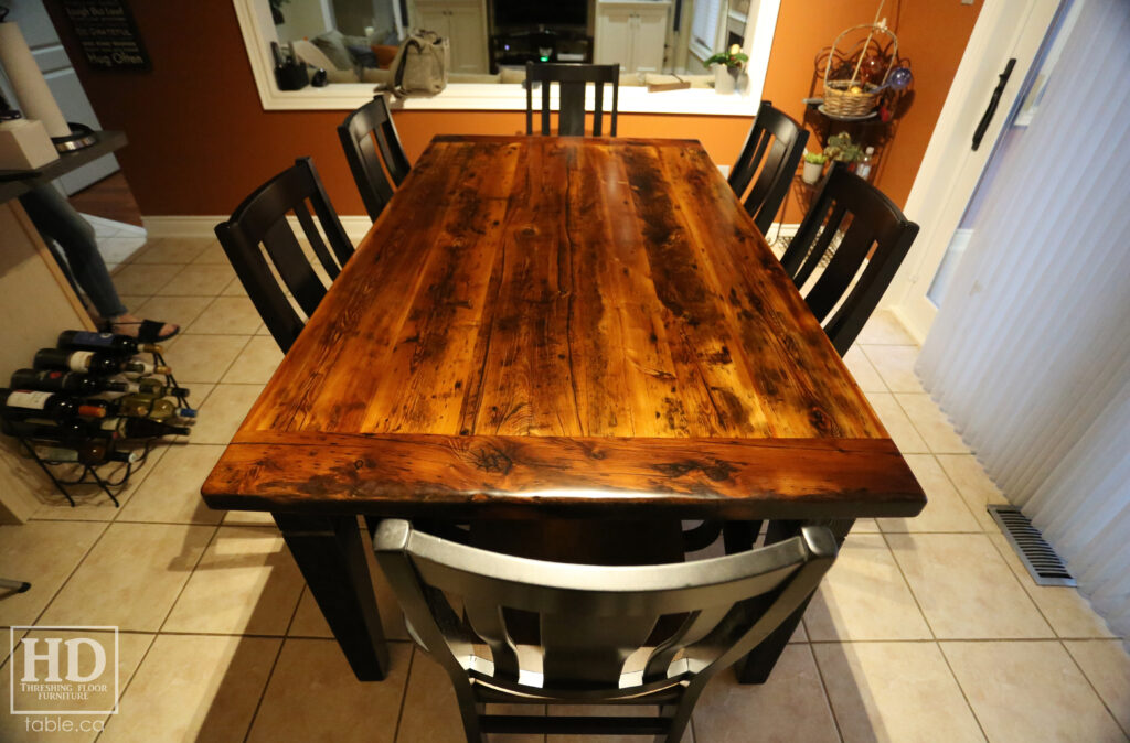 6' Reclaimed Ontario Barnwood Table we made for a Richmond Hill, Ontario home - 42" wide - Harvest Base: Tapered with a Notch Windbrace Beam Legs - Black Painted Base - Old Growth Hemlock Threshing Floor Construction - Original edges & distressing maintained - Premium epoxy + satin polyurethane finish - Modified Plank Back Chairs / Wormy Maple / Polyurethane clearcoat finish - www.table.ca