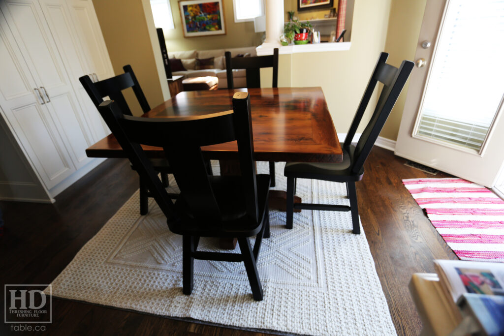 48" x 48" Ontario Barnwood Table we made for an Oakville home - Hand-Hewn Pedestal Post - Old Growth Reclaimed Hemlock Threshing Floor Construction - Original edges & distressing maintained - Premium epoxy + satin polyurethane finish - 4 Plank Back Chairs / Wormy Maple / Painted Solid Black - www.table.ca