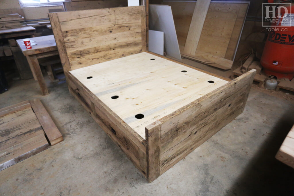 Ontario Barnwood Queen Size Platform Bed we made for a Chatham home - 2" Thick Hemlock Threshing Floor Construction - Headboard 48" Height / Footboard 24" height - [4] Large Storage Drawers / Lockable Drawer Option - Lee Valley Hardware - Slats + Plywood Support - Original edges & distressing maintained - Satin polyurethane clearcoat finish / www.table.ca