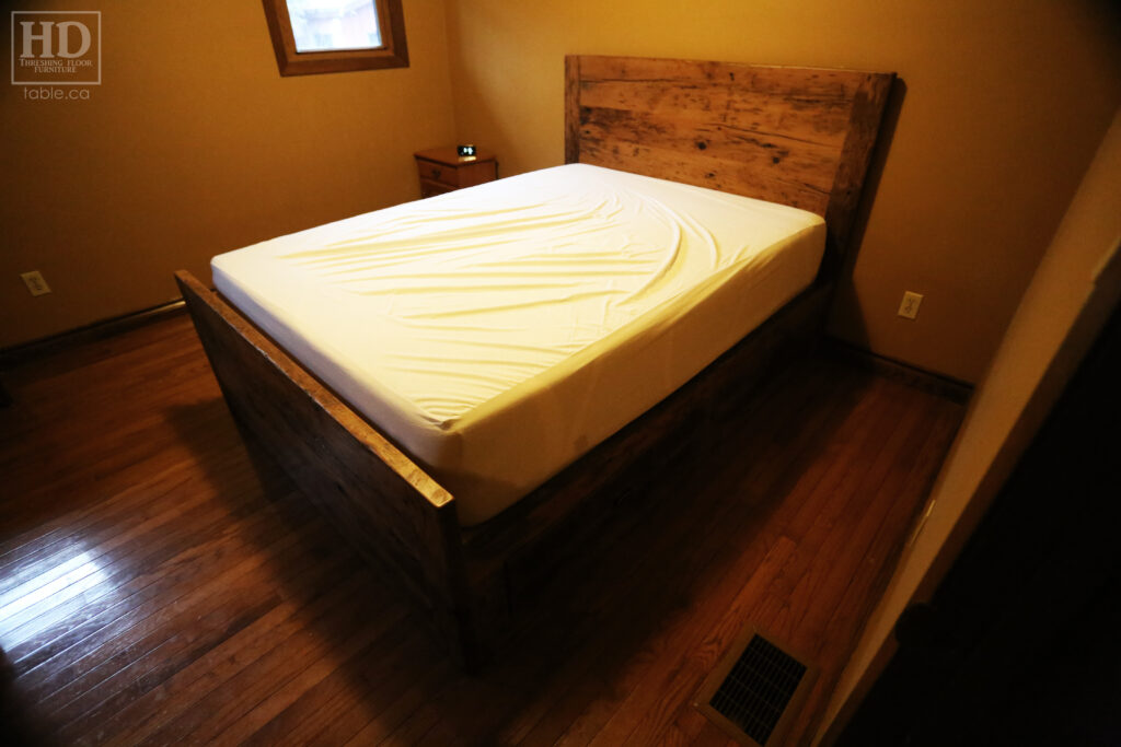 Ontario Barnwood Queen Size Platform Bed we made for a Chatham home - 2" Thick Hemlock Threshing Floor Construction - Headboard 48" Height / Footboard 24" height - [4] Large Storage Drawers / Lockable Drawer Option - Lee Valley Hardware - Slats + Plywood Support - Original edges & distressing maintained - Satin polyurethane clearcoat finish / www.table.ca