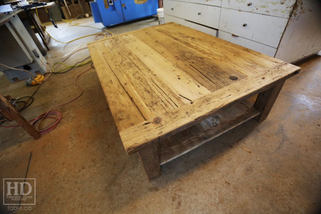46" x 66" Ontario Barnwood Coffee Table we made for a Drumbo home - 18" height - Old Growth Reclaimed Hemlock Construction - Straight 4"x4" Windbrace Beam Legs -  Bottom 1" Grainery Board Shelf - Original edges & distressing maintained - Premium epoxy + matte polyurethane finish - www.table.ca
