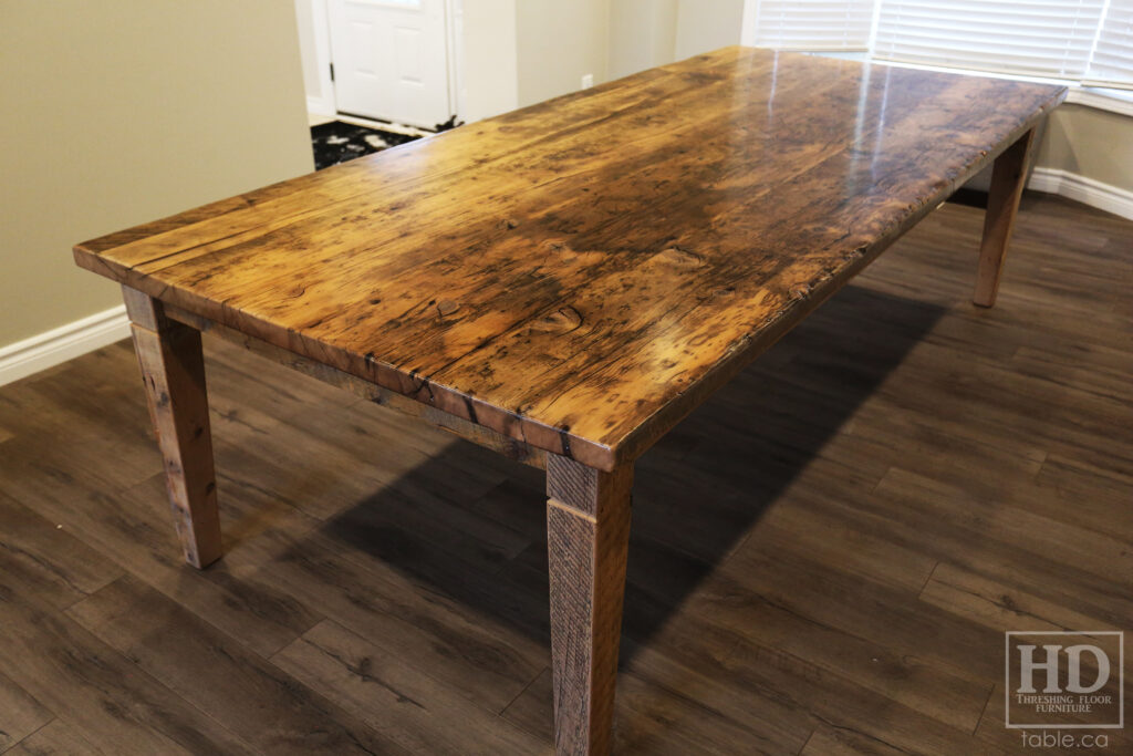 9' Ontario Barnwood Table we made for an Orangeville Home - Harvest Base: Tapered with a Notch Windbrace Beam Legs - No bread boards ends Option - Reclaimed Old Growth Hemlock Threshing Floor Construction - Original distressing & edges maintained - Greytone Option - Premium epoxy + satin polyurethane finish - www.table.ca