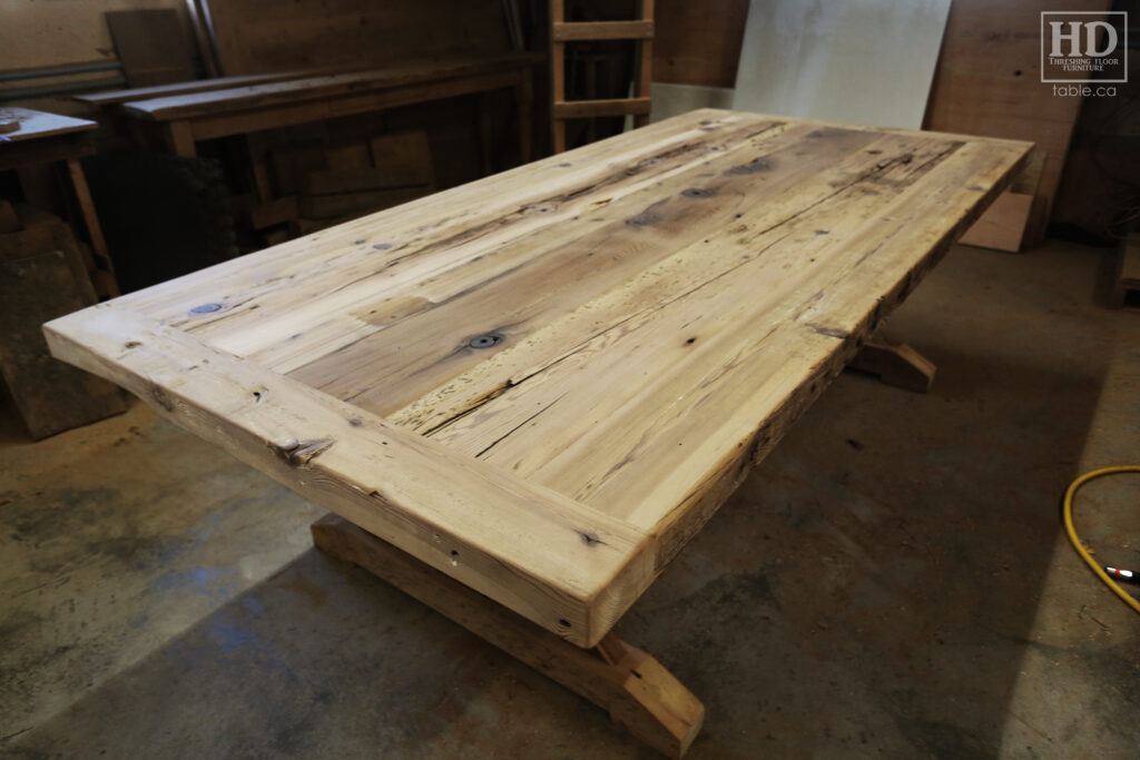 8.5' Ontario Barnwood Table we made for an Aurora home - 48" wide - Sawbuck Base - Extra thick 3" Top Option - Old Growth Reclaimed Hemlock Threshing Floor Construction - Original edges & distressing maintained - www.table.ca