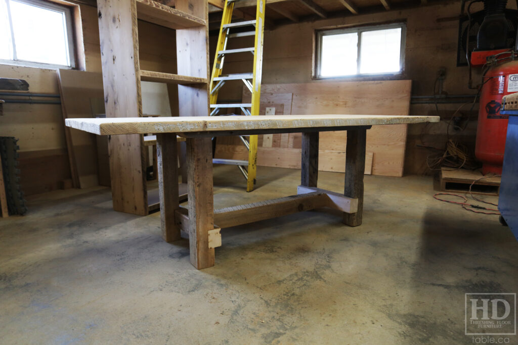 86" Reclaimed Ontario Barnwood Table we made for a Mount Pleasant home - 42" wide - Frame Base - Old Growth Hemlock Threshing Floor Construction - Original edges & distressing maintained - Black Stain Option Top - Painted Option Base - Premium epoxy + satin polyurethane finish - www.table.ca