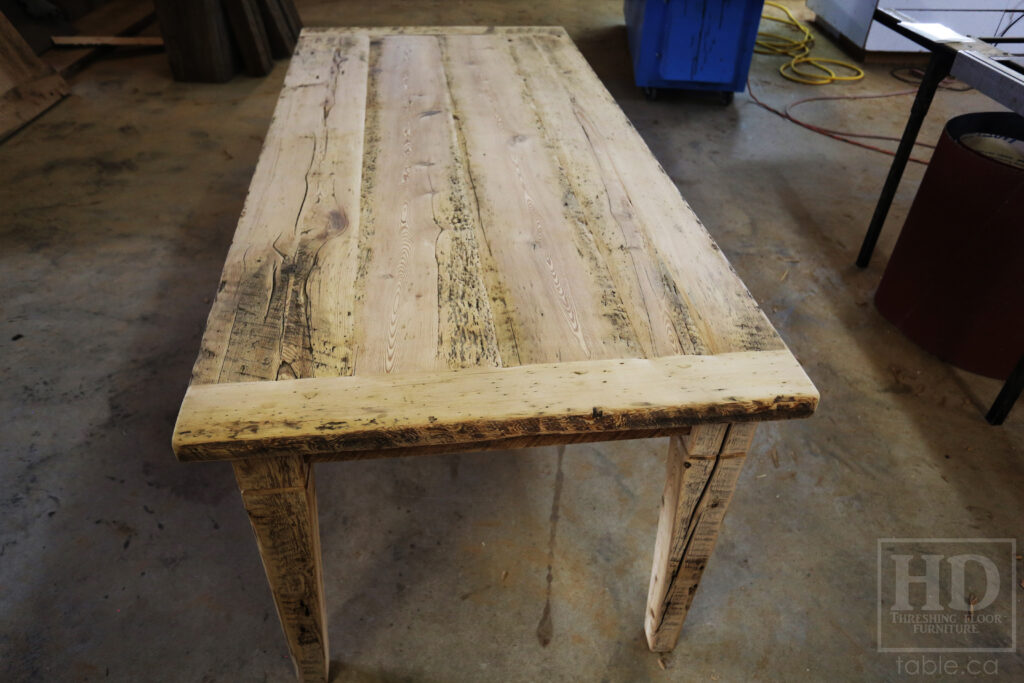 6.5' Ontario Barnwood Table - Harvest Base: Tapered with a Notch Windbrace Beam Legs - Reclaimed Old Growth Hemlock Threshing Floor Construction - Original distressing & edges maintained - Premium epoxy + satin polyurethane finish - www.table.ca